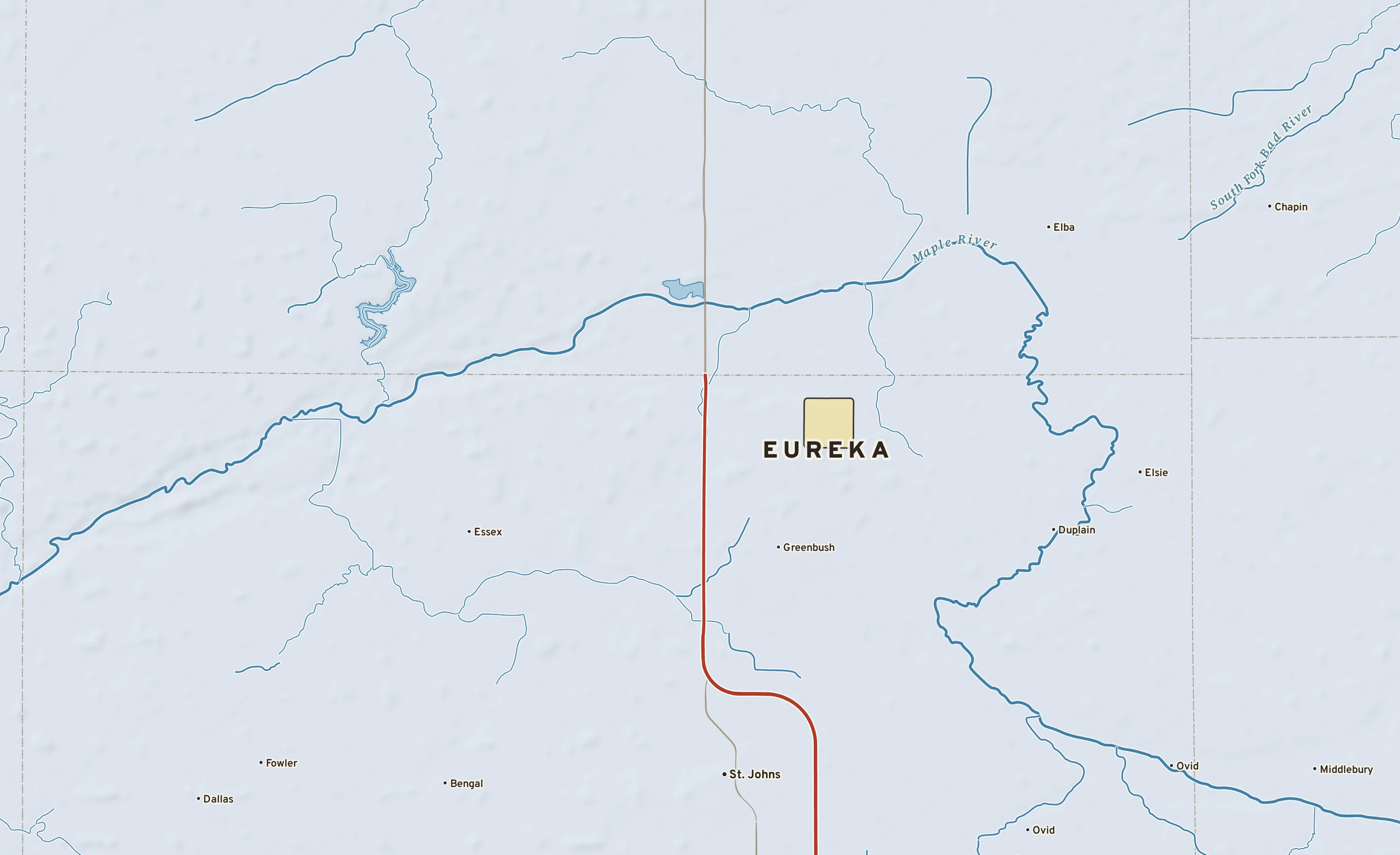 Shaded-relief atlas plate of Eureka, Michigan: rivers, roads, the city limits and where the water drains.
