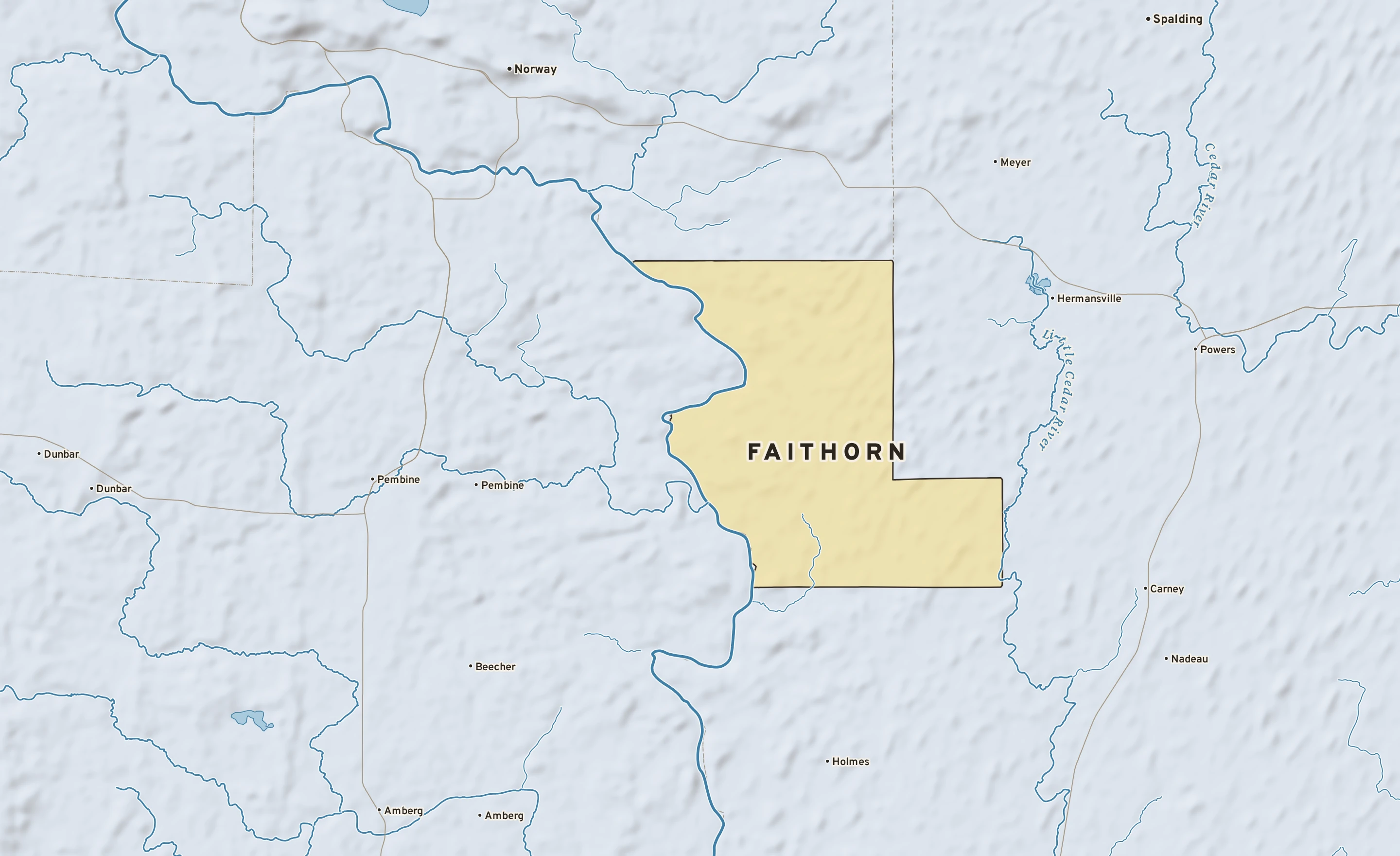 Shaded-relief atlas plate of Faithorn, Michigan: rivers, roads, the city limits and where the water drains.