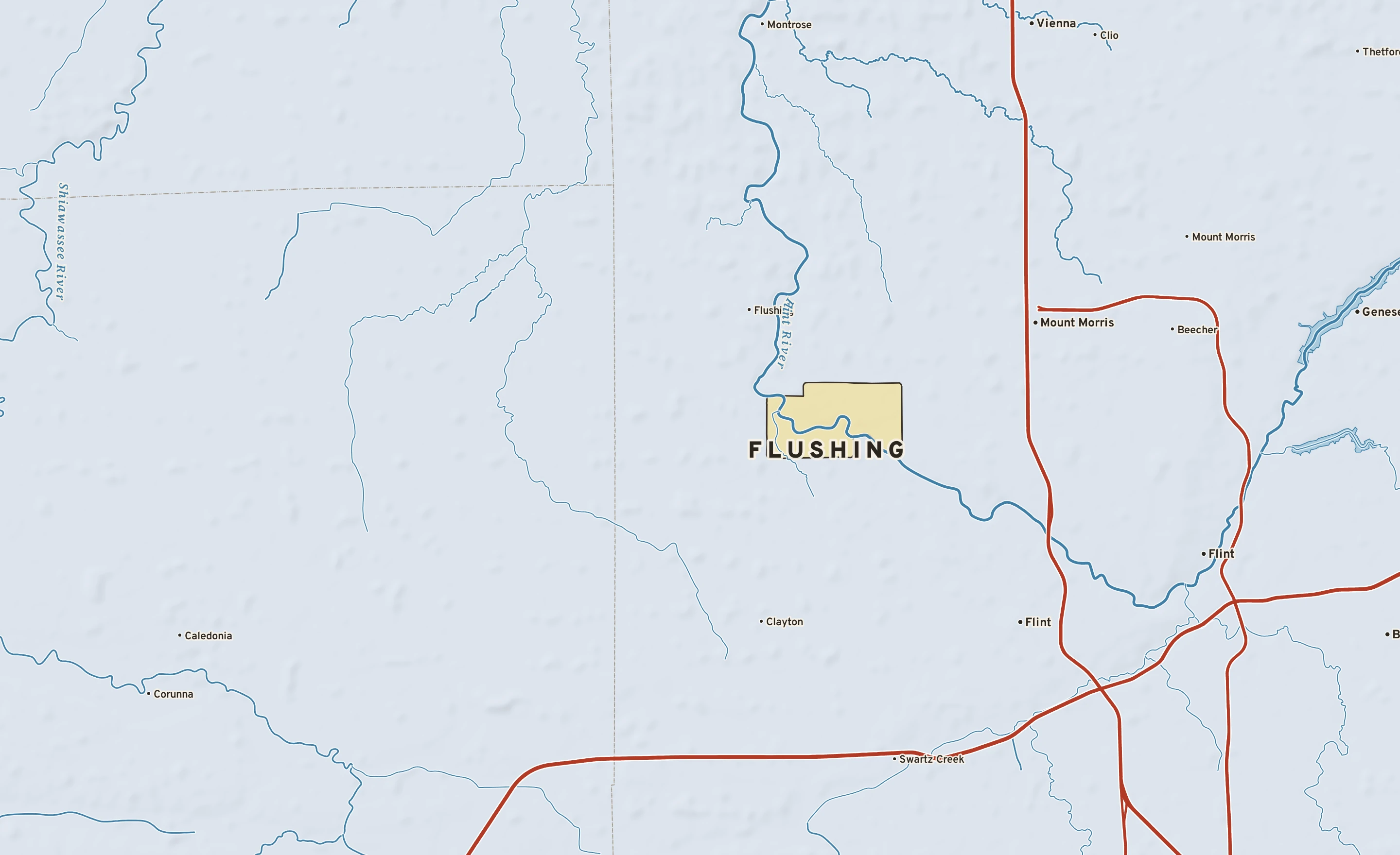 Shaded-relief atlas plate of Flushing, Michigan: rivers, roads, the city limits and where the water drains.