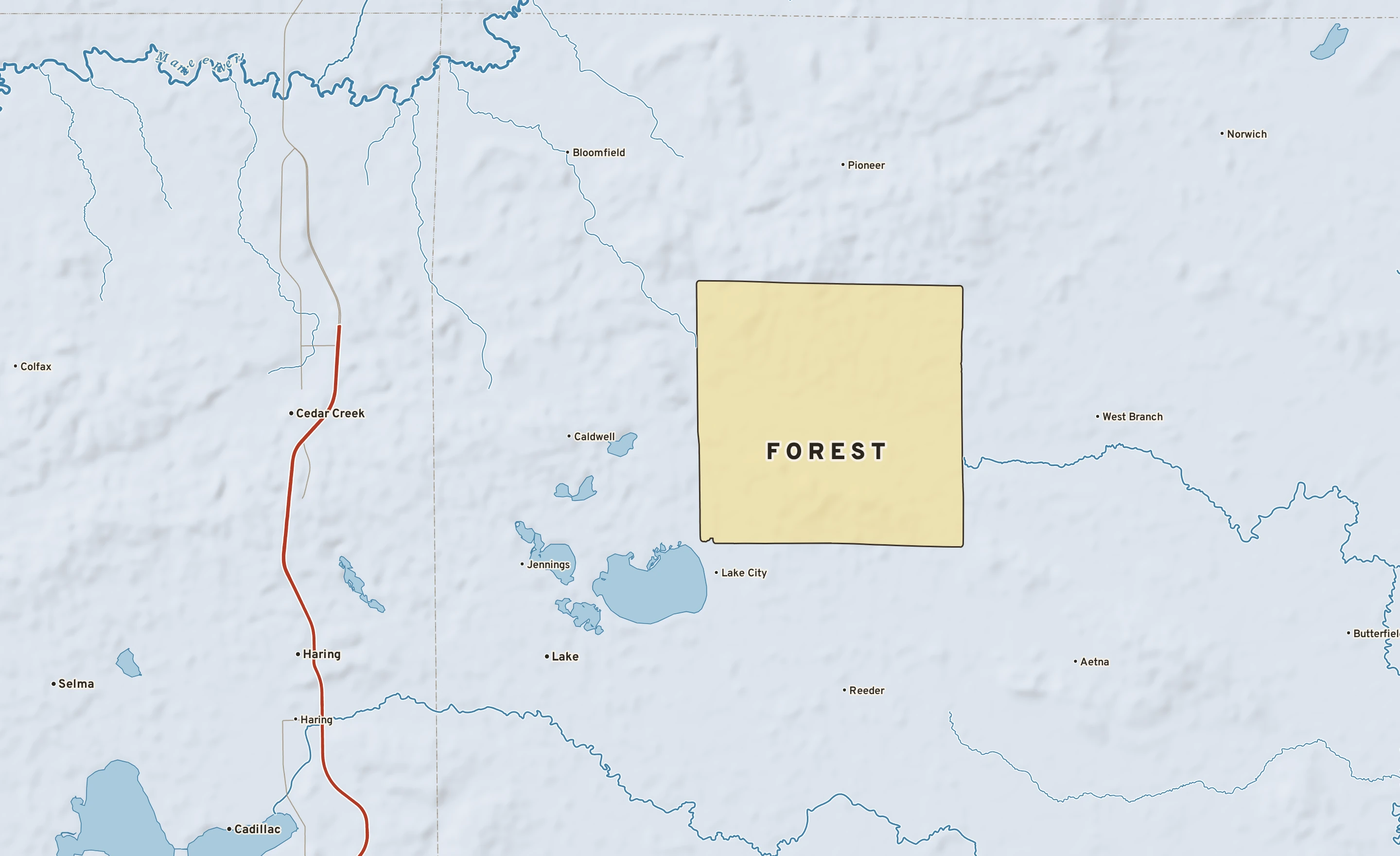 Shaded-relief atlas plate of Forest, Michigan: rivers, roads, the city limits and where the water drains.
