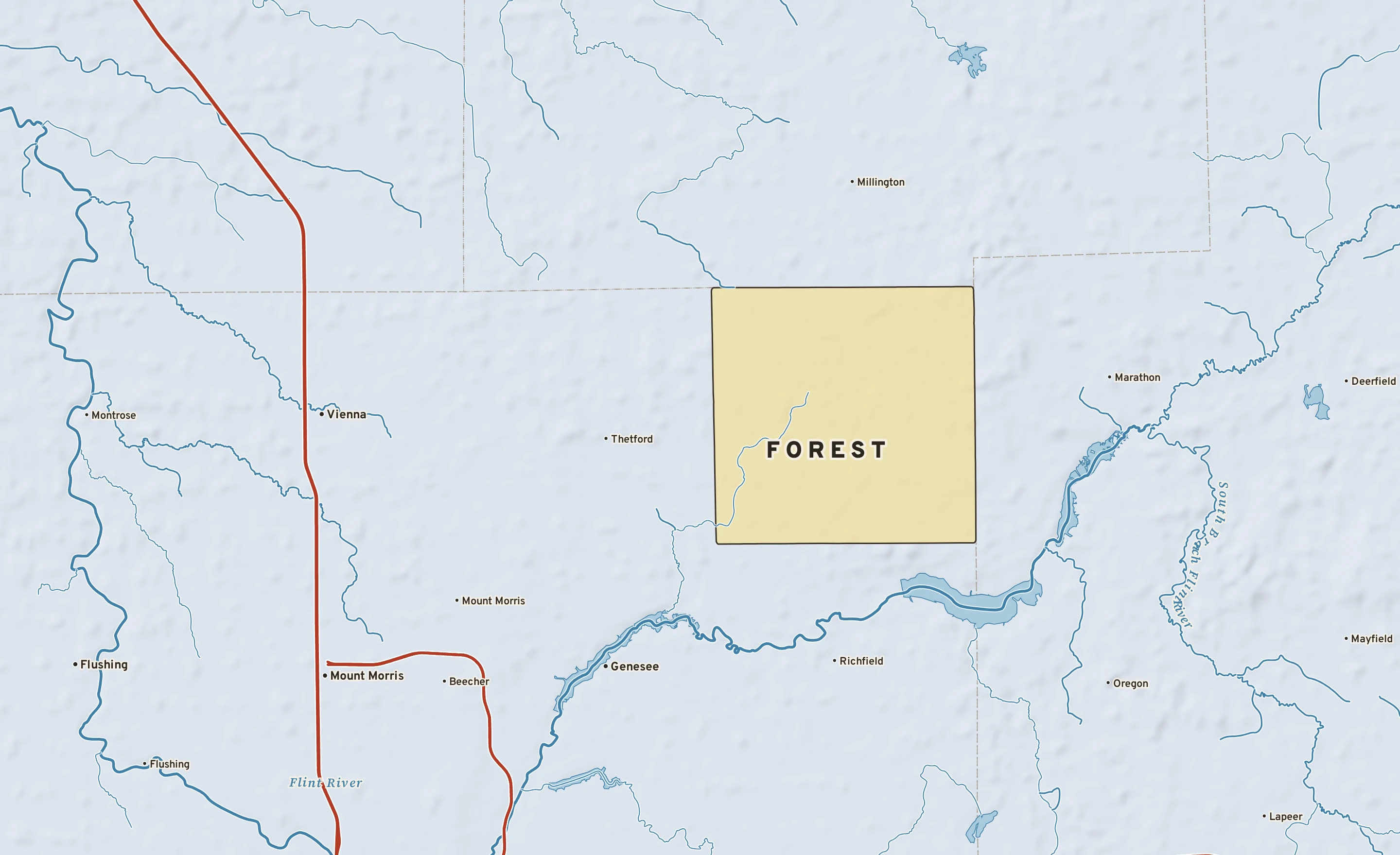 Shaded-relief atlas plate of Forest, Michigan: rivers, roads, the city limits and where the water drains.