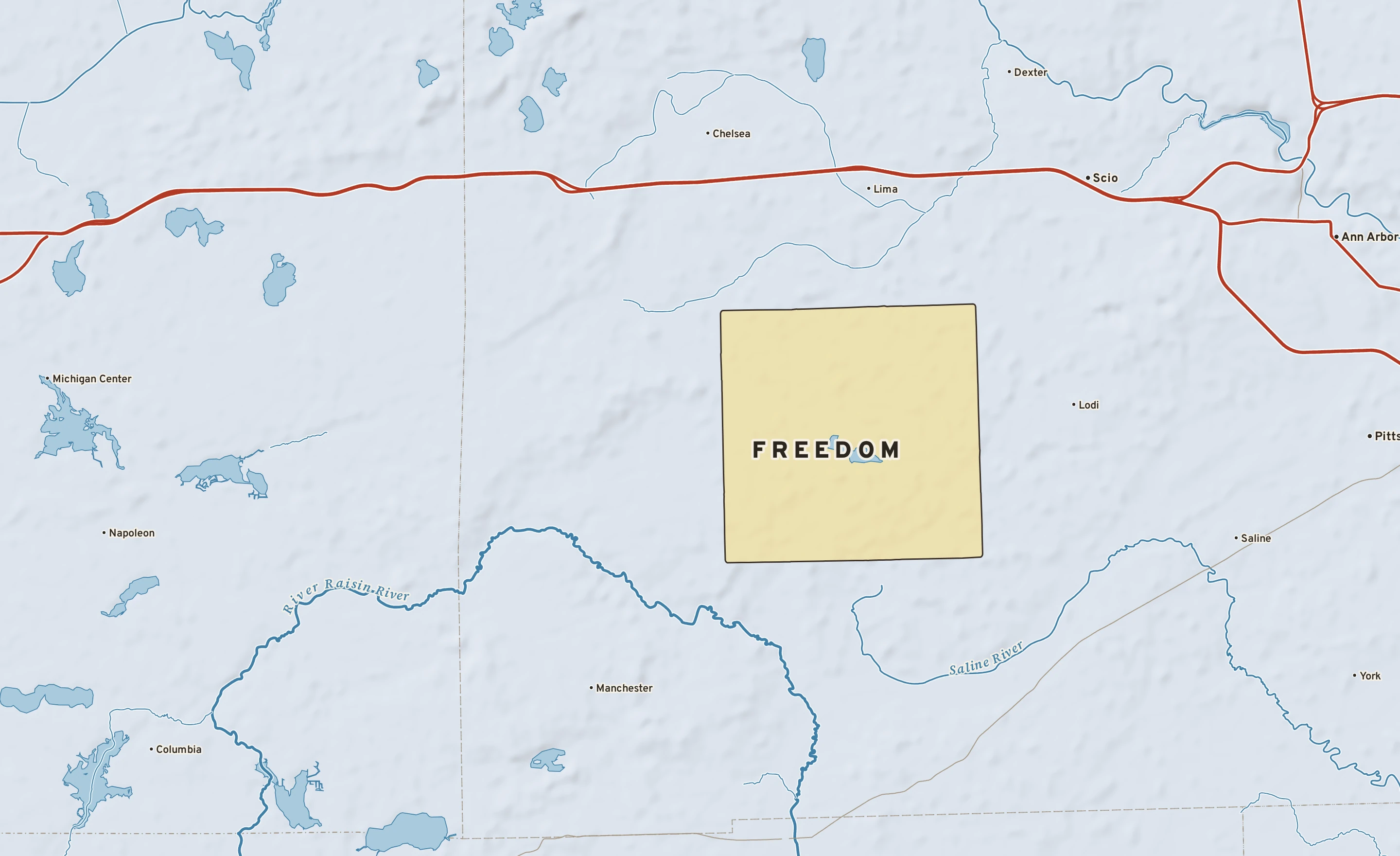 Shaded-relief atlas plate of Freedom, Michigan: rivers, roads, the city limits and where the water drains.