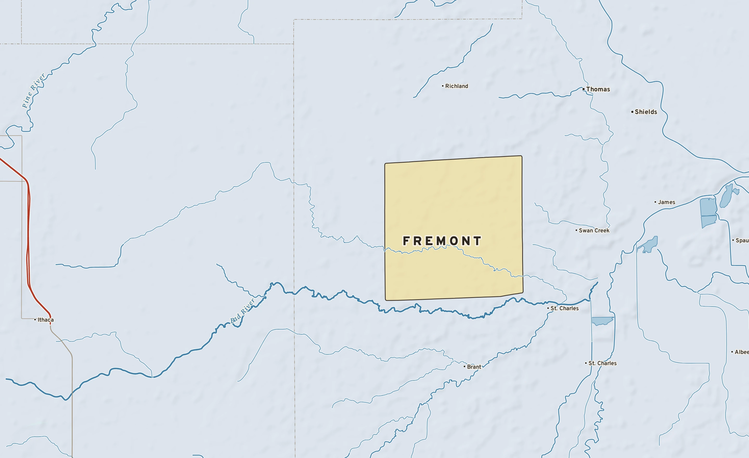 Shaded-relief atlas plate of Fremont, Michigan: rivers, roads, the city limits and where the water drains.