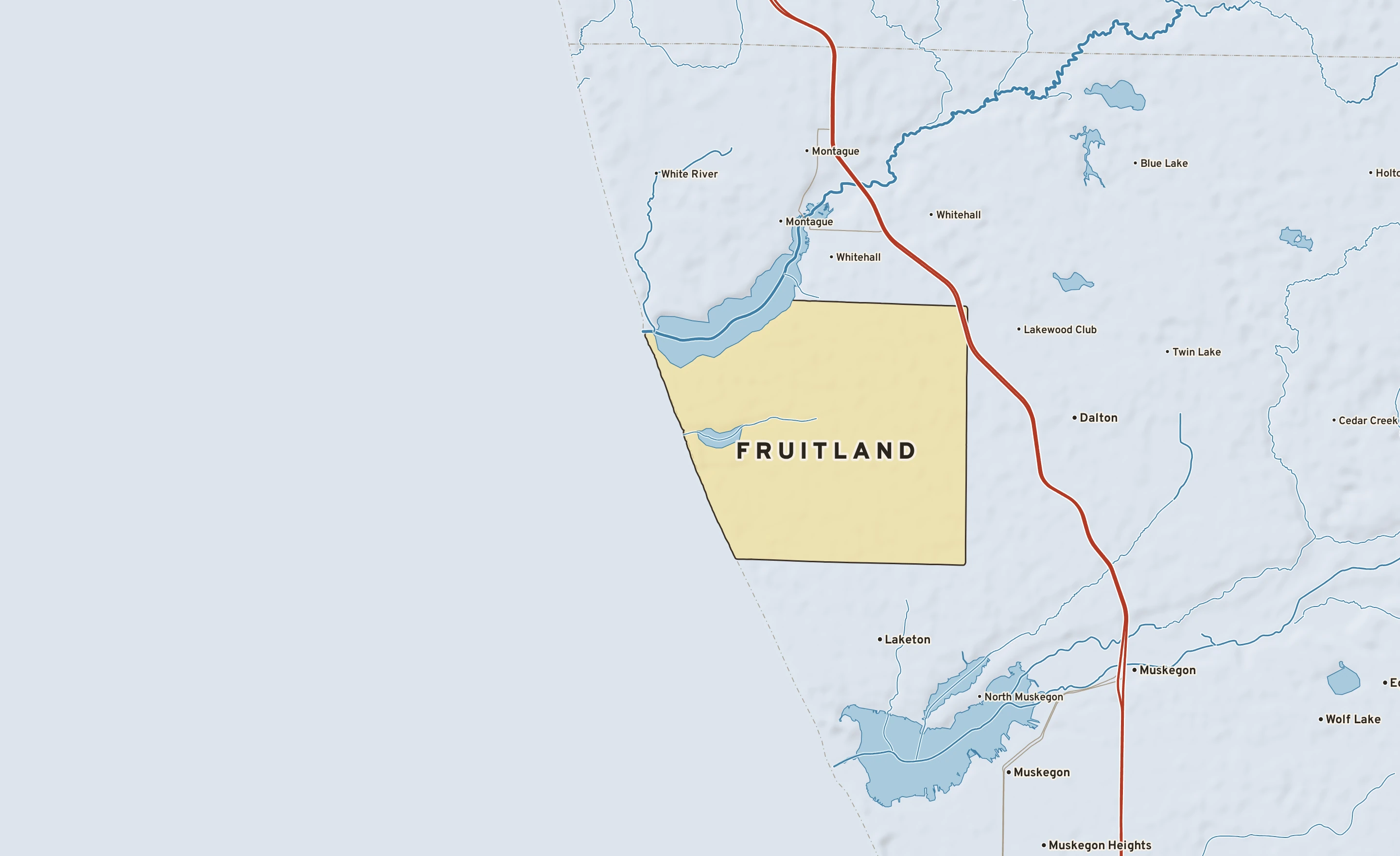 Shaded-relief atlas plate of Fruitland, Michigan: rivers, roads, the city limits and where the water drains.