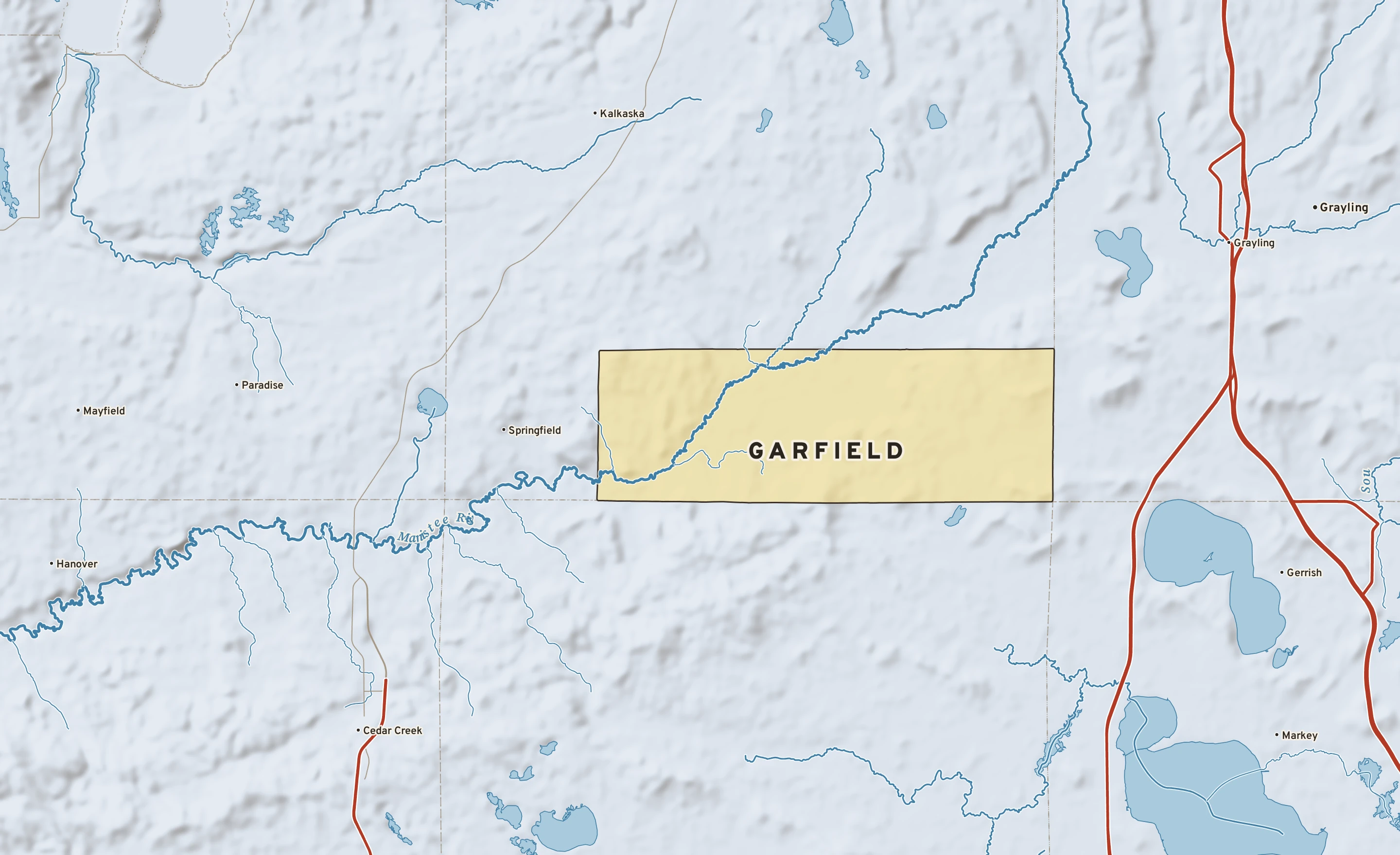 Shaded-relief atlas plate of Garfield, Michigan: rivers, roads, the city limits and where the water drains.