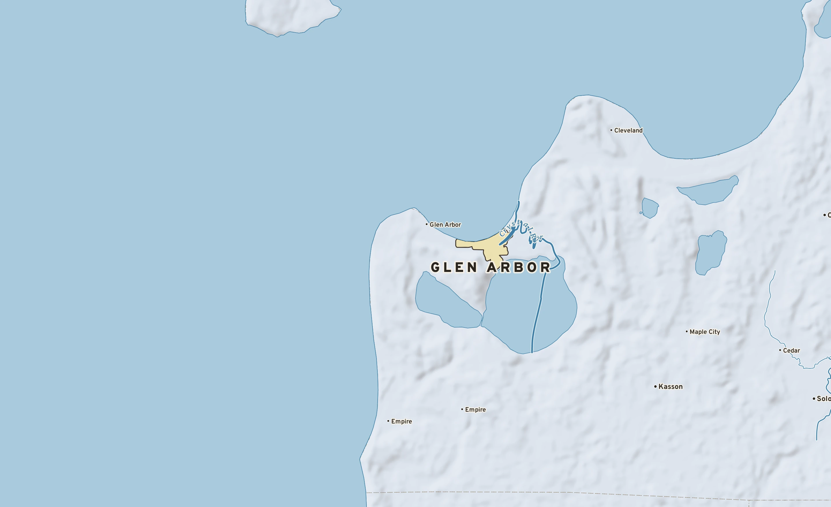 Shaded-relief atlas plate of Glen Arbor, Michigan: rivers, roads, the city limits and where the water drains.
