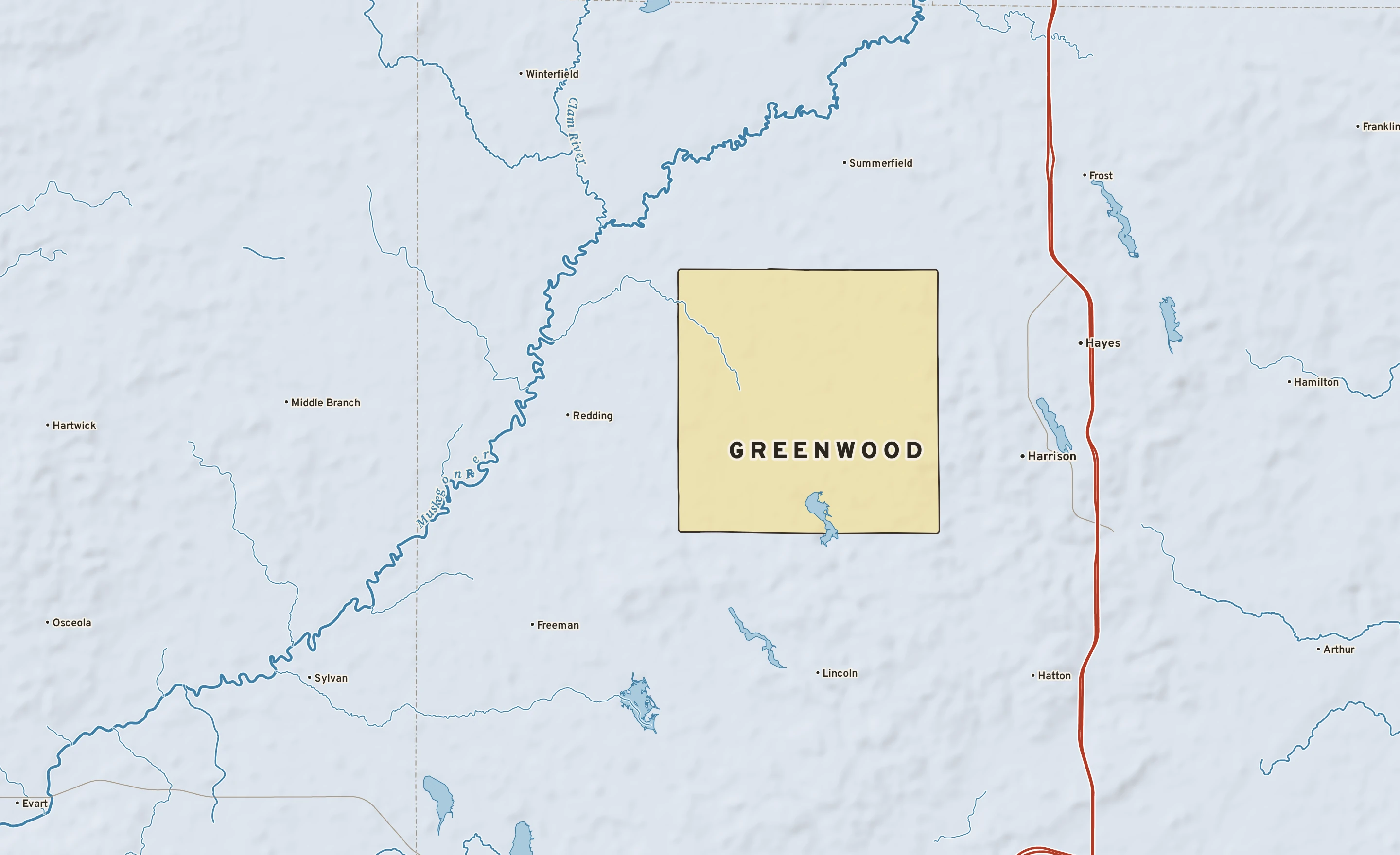 Shaded-relief atlas plate of Greenwood, Michigan: rivers, roads, the city limits and where the water drains.