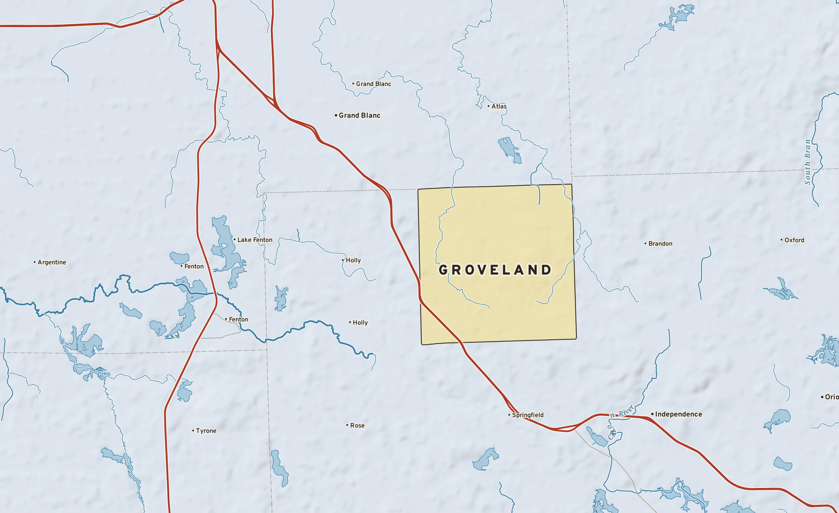 Shaded-relief atlas plate of Groveland, Michigan: rivers, roads, the city limits and where the water drains.