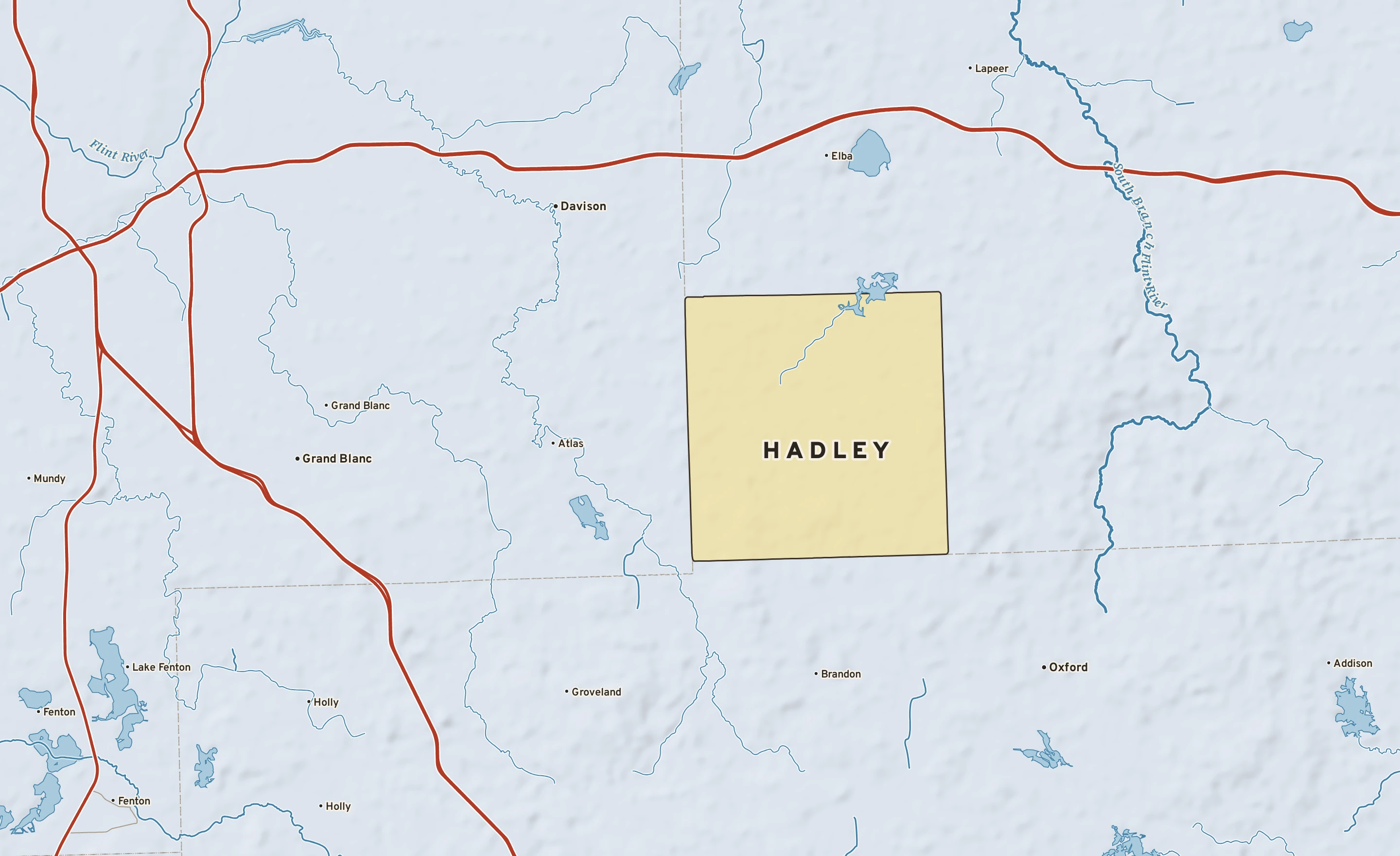 Shaded-relief atlas plate of Hadley, Michigan: rivers, roads, the city limits and where the water drains.