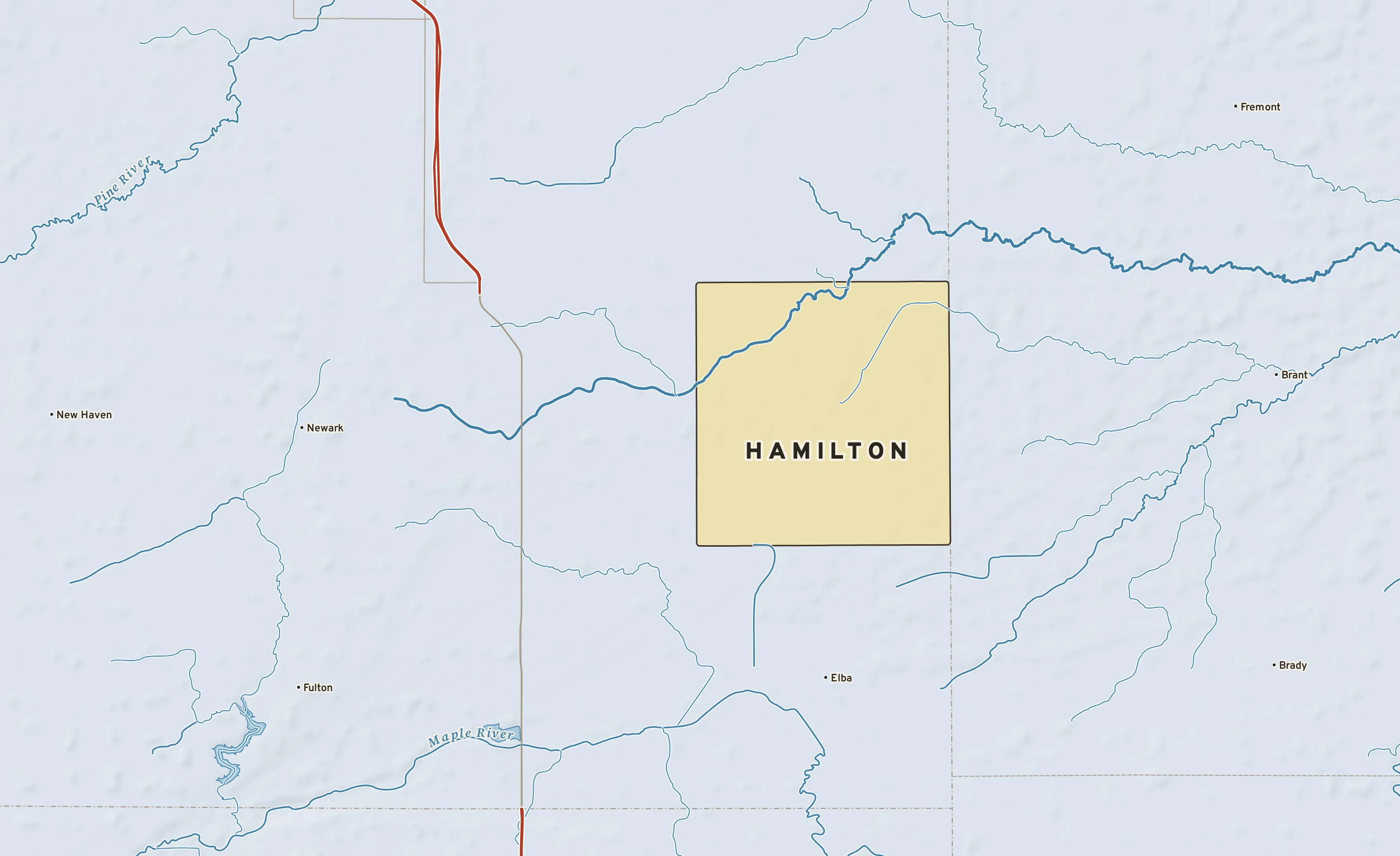 Shaded-relief atlas plate of Hamilton, Michigan: rivers, roads, the city limits and where the water drains.