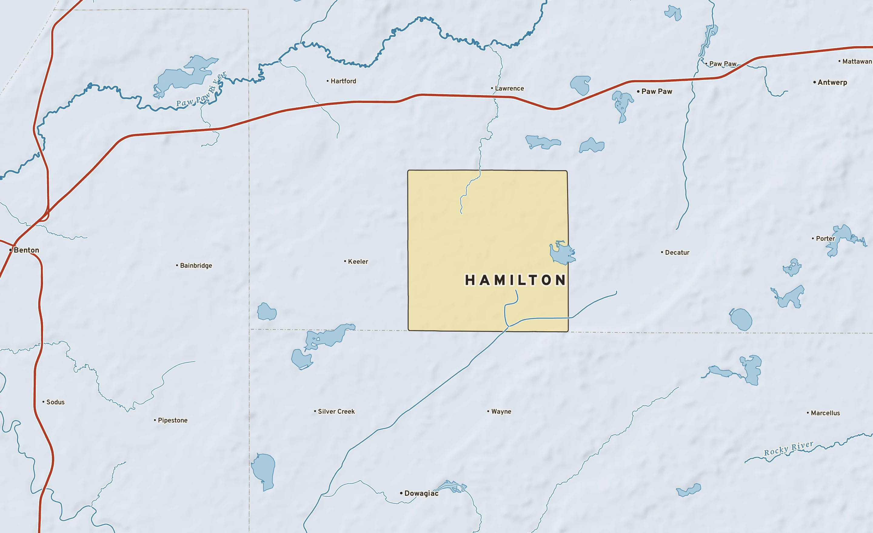 Shaded-relief atlas plate of Hamilton, Michigan: rivers, roads, the city limits and where the water drains.
