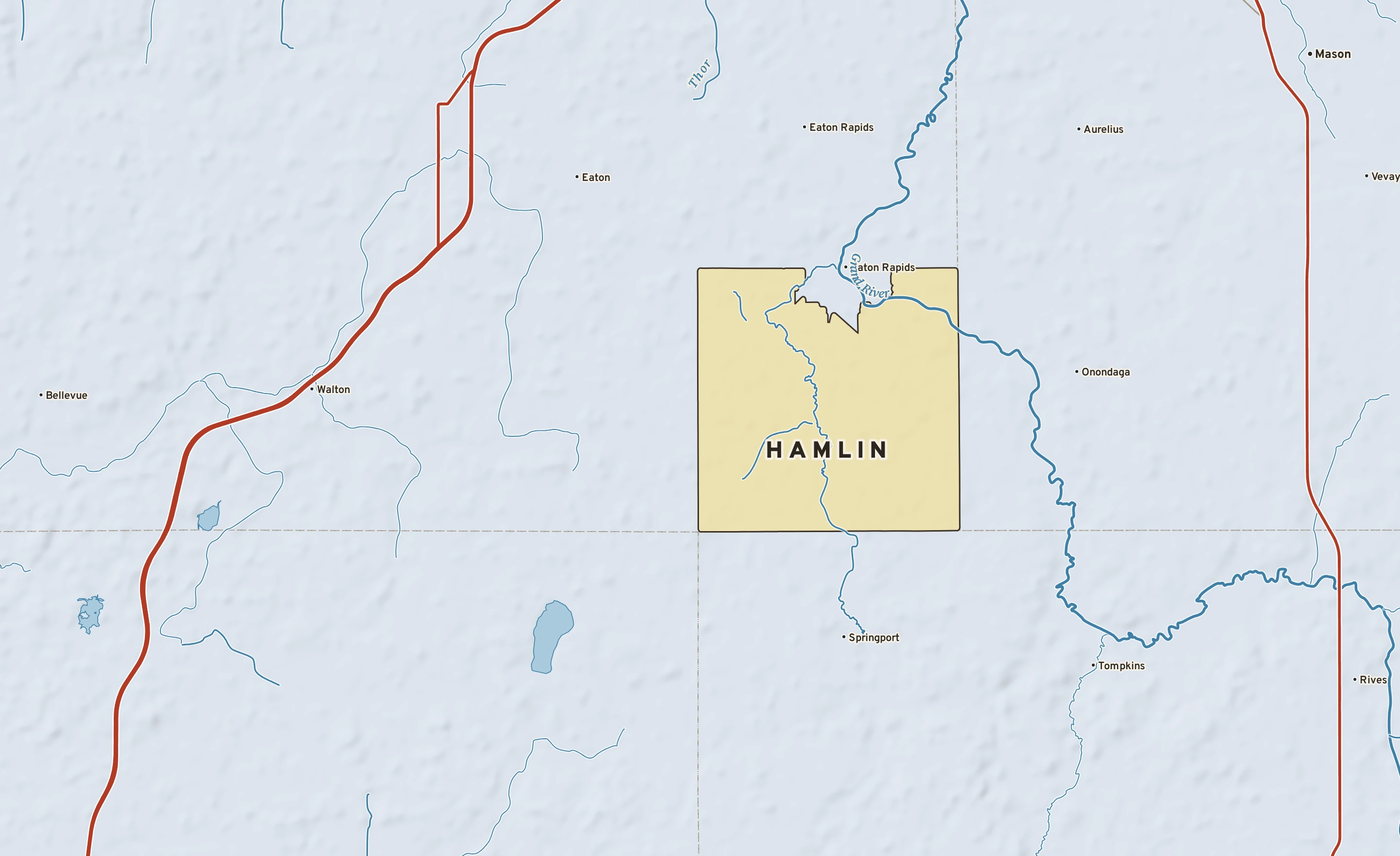 Shaded-relief atlas plate of Hamlin, Michigan: rivers, roads, the city limits and where the water drains.