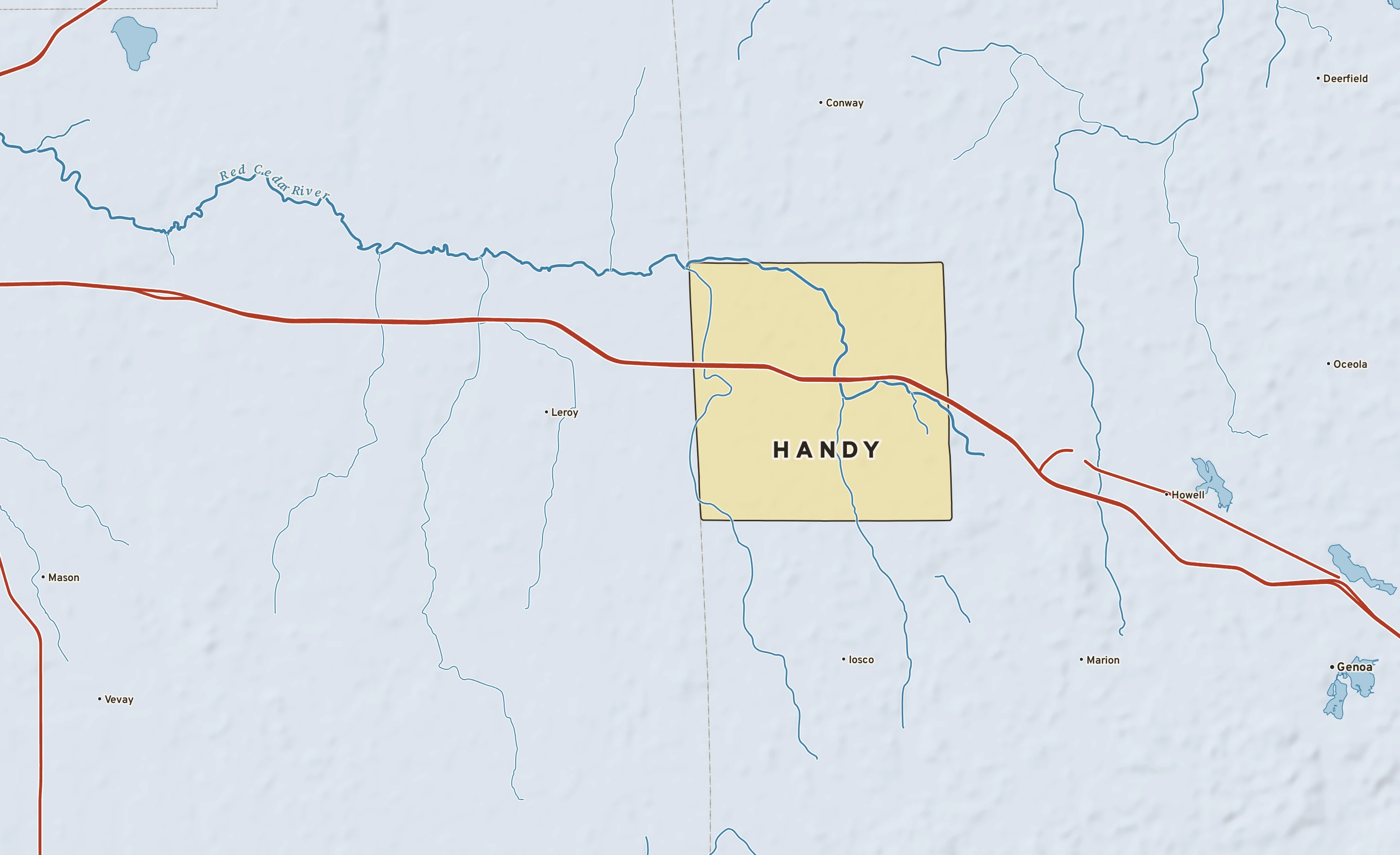 Shaded-relief atlas plate of Handy, Michigan: rivers, roads, the city limits and where the water drains.