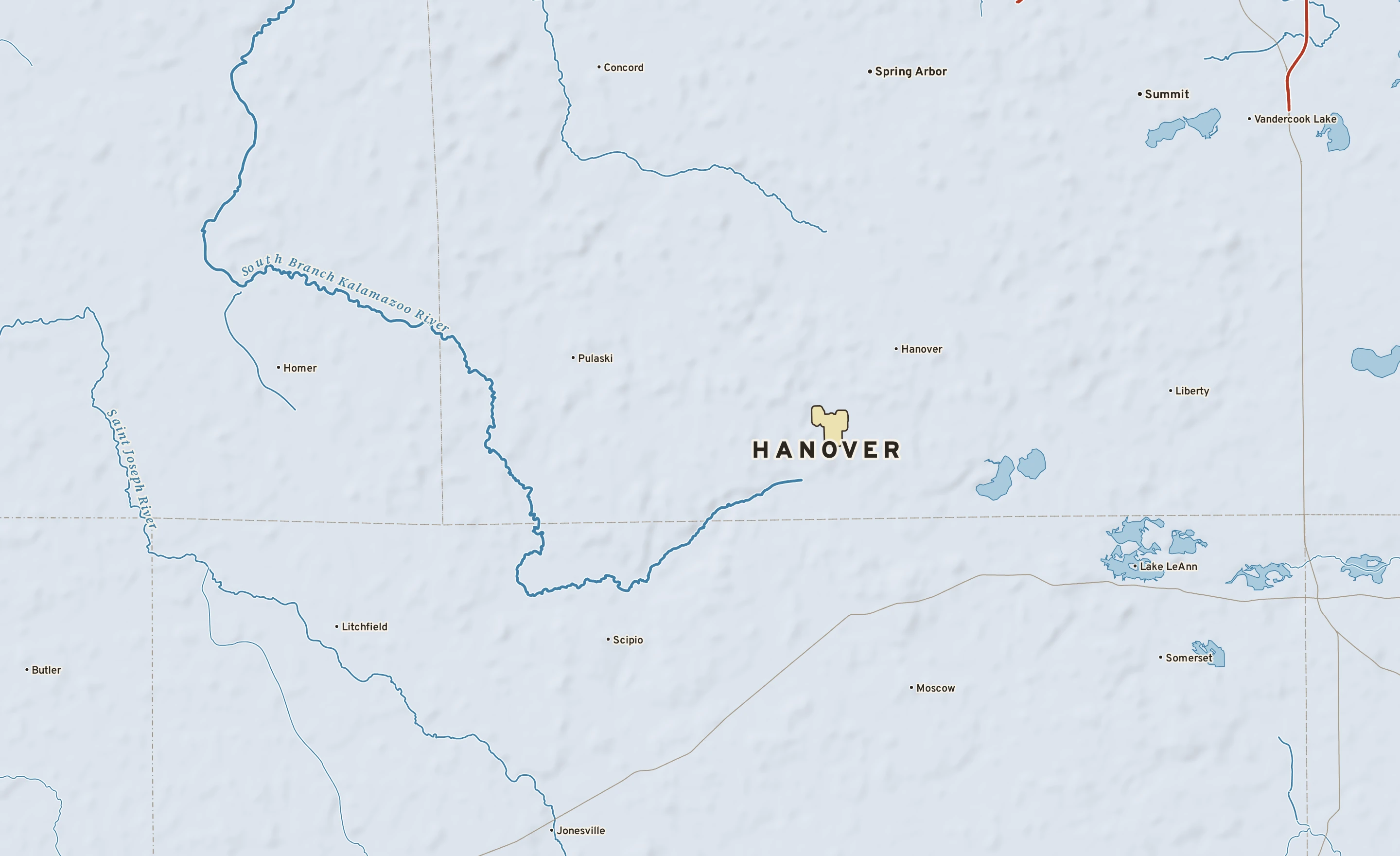Shaded-relief atlas plate of Hanover, Michigan: rivers, roads, the city limits and where the water drains.