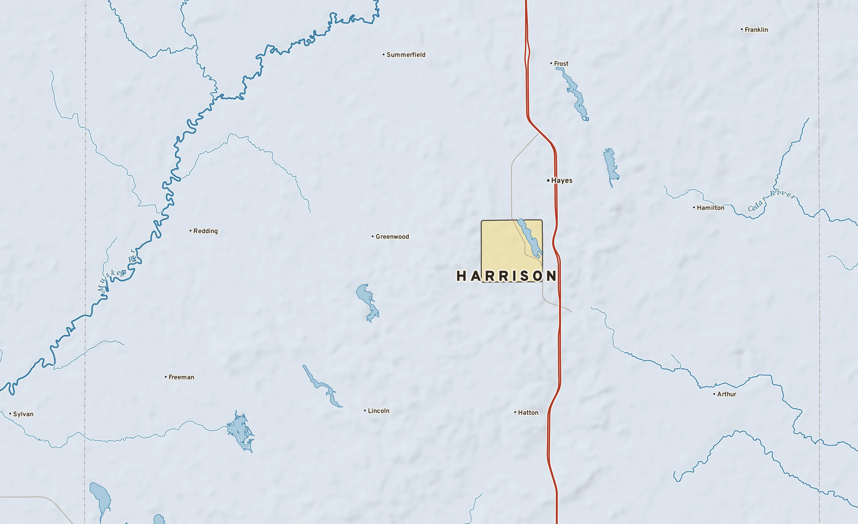 Shaded-relief atlas plate of Harrison, Michigan: rivers, roads, the city limits and where the water drains.