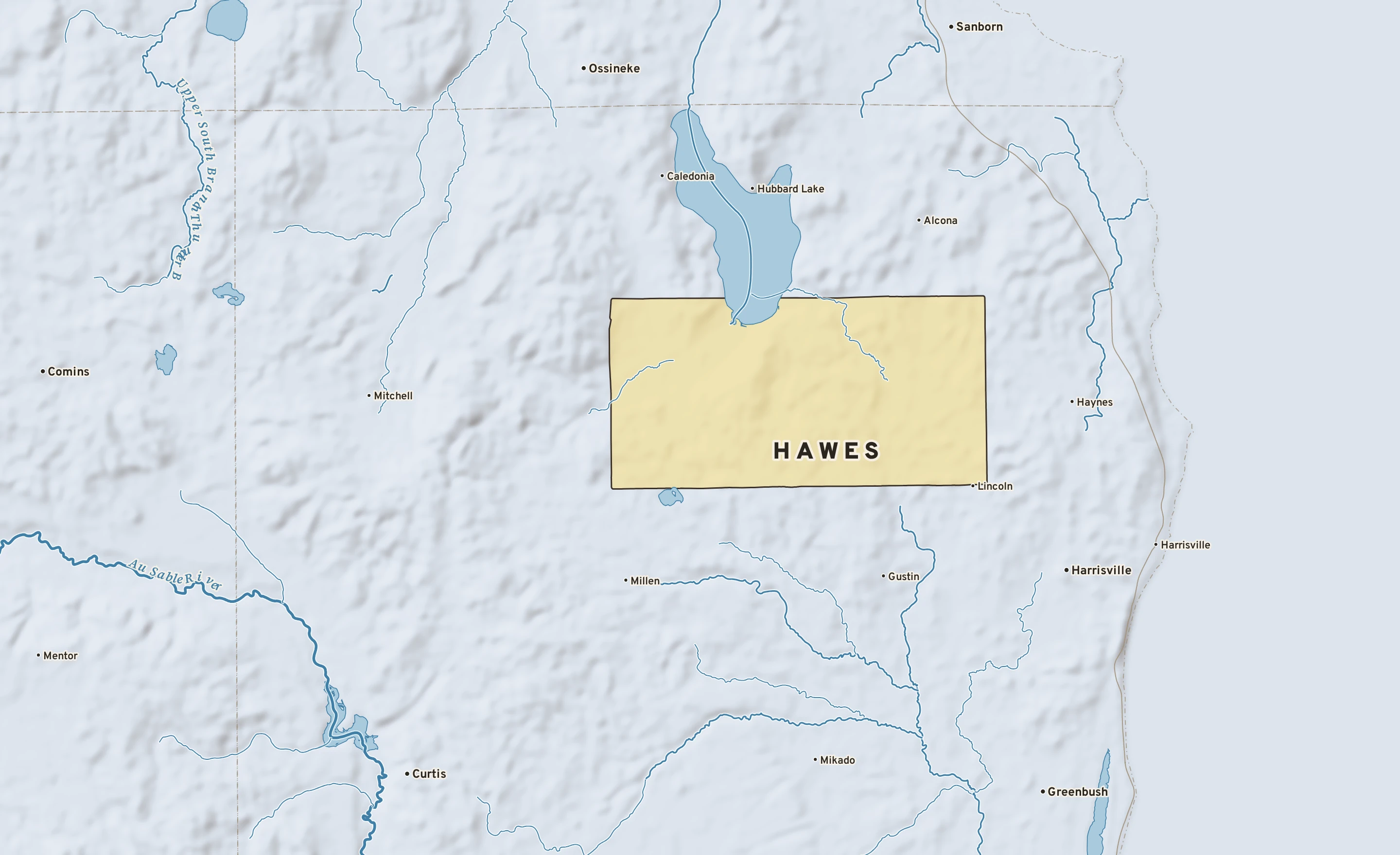 Shaded-relief atlas plate of Hawes, Michigan: rivers, roads, the city limits and where the water drains.