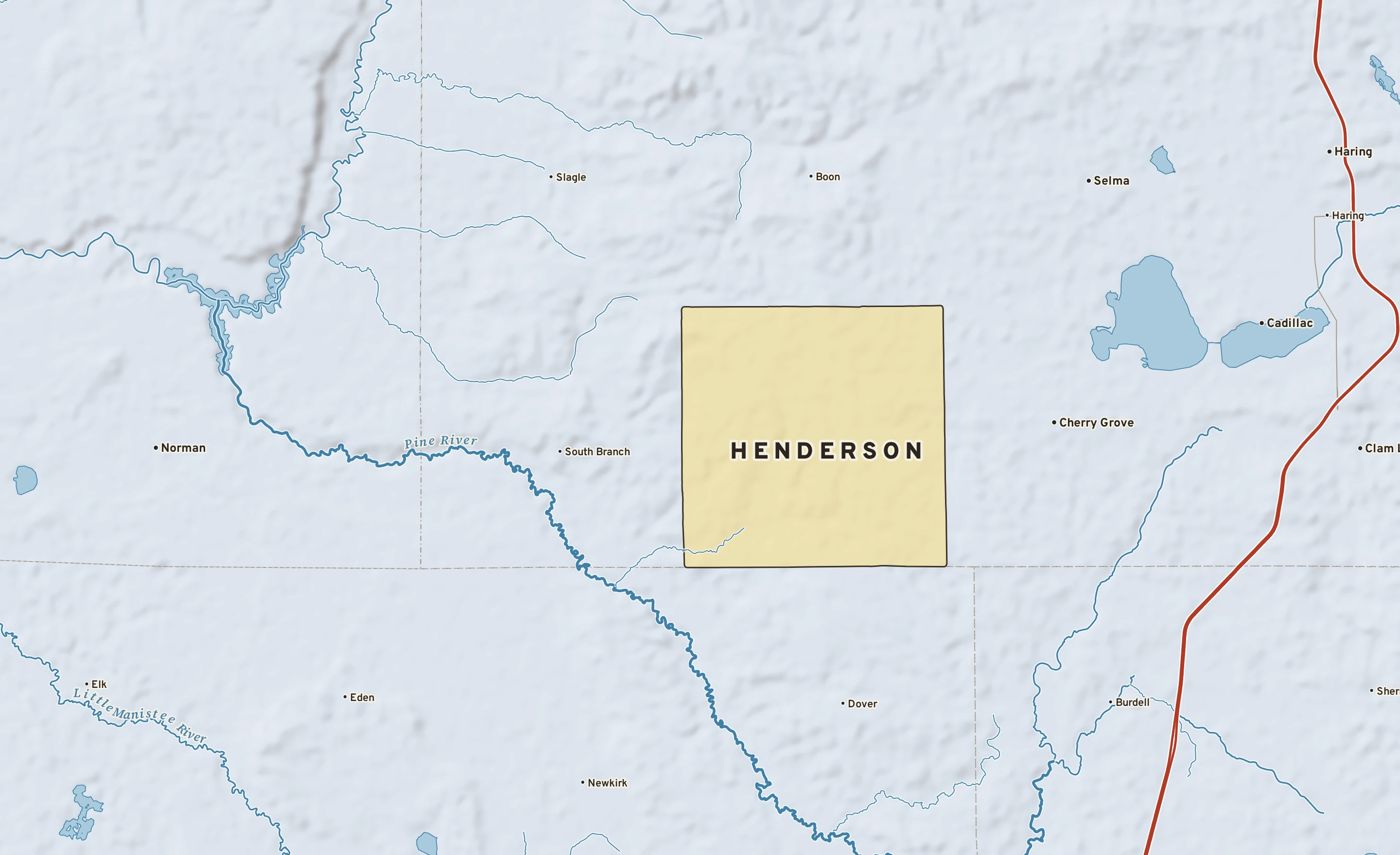 Shaded-relief atlas plate of Henderson, Michigan: rivers, roads, the city limits and where the water drains.