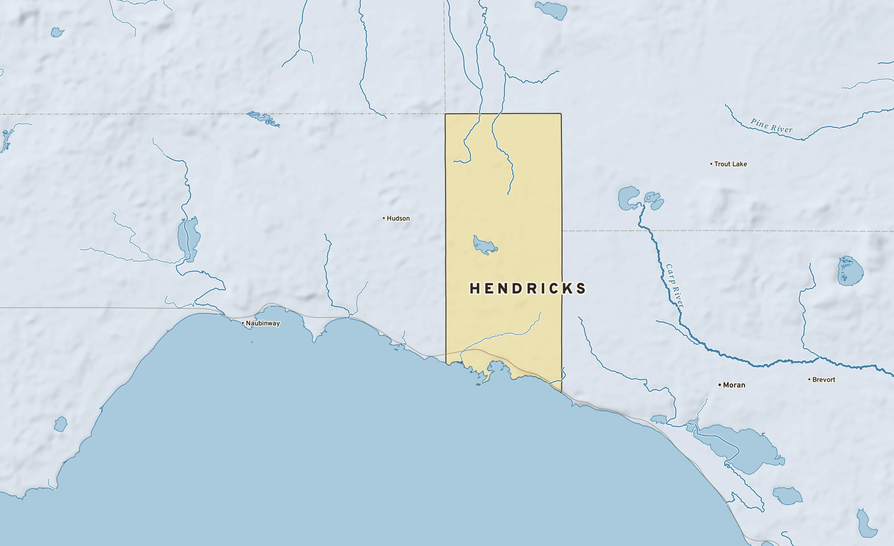 Shaded-relief atlas plate of Hendricks, Michigan: rivers, roads, the city limits and where the water drains.