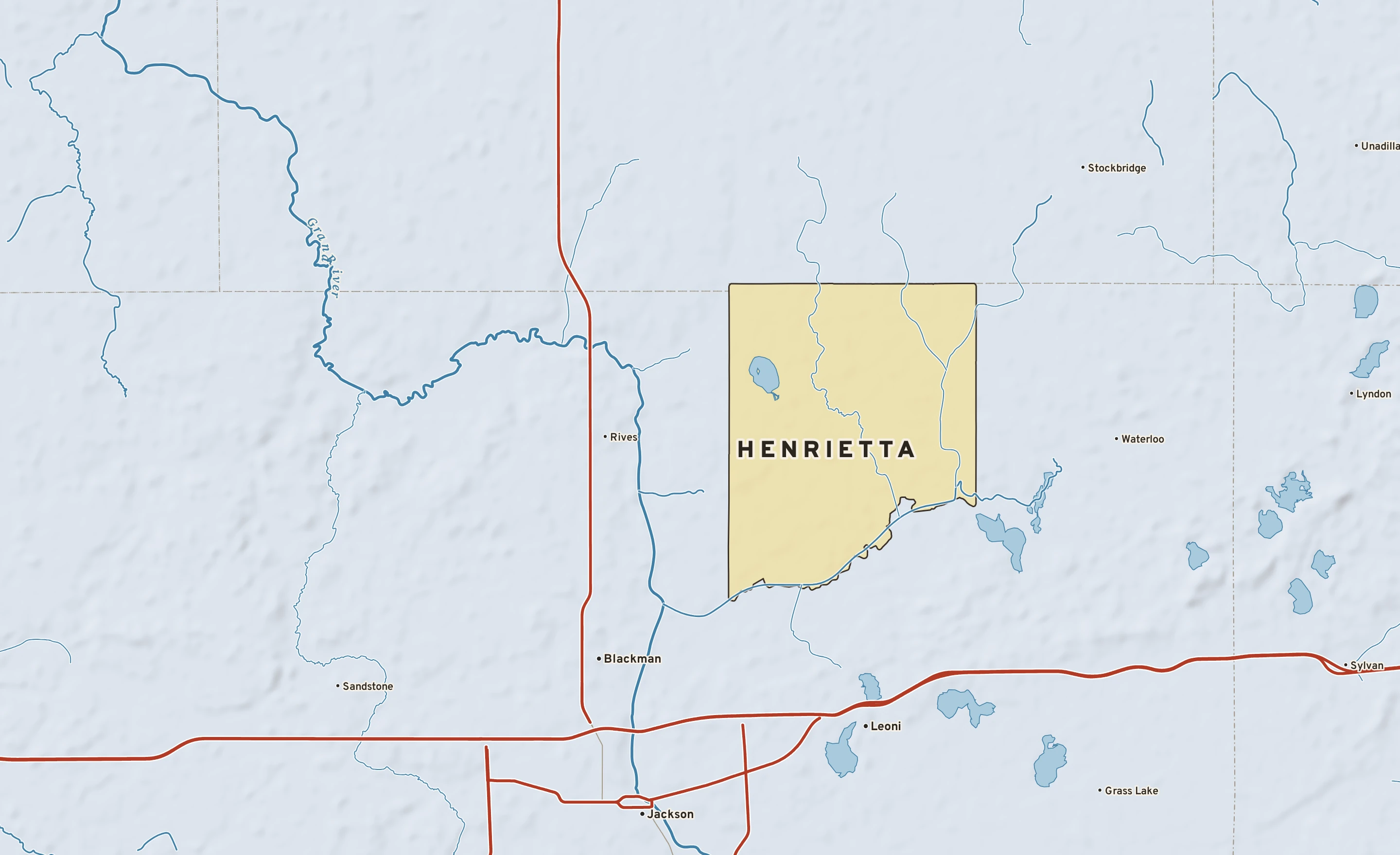 Shaded-relief atlas plate of Henrietta, Michigan: rivers, roads, the city limits and where the water drains.