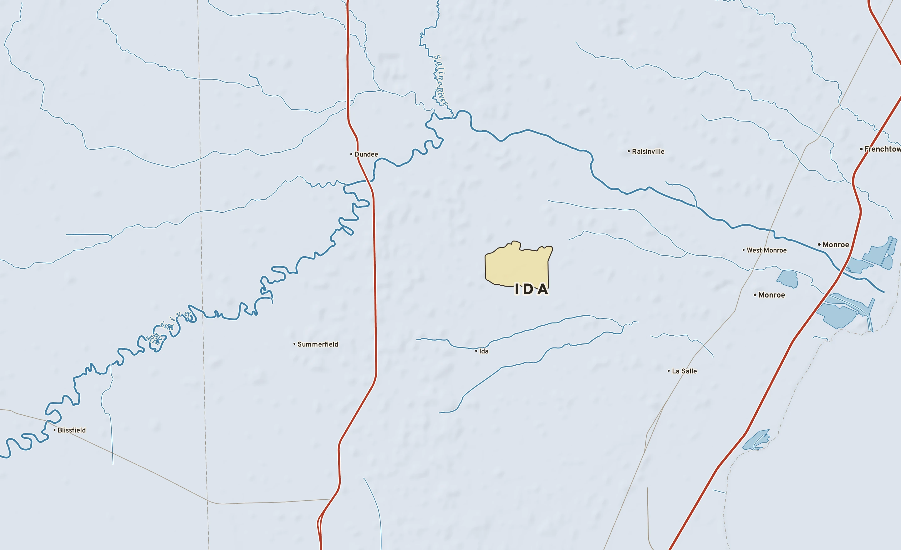 Shaded-relief atlas plate of Ida, Michigan: rivers, roads, the city limits and where the water drains.