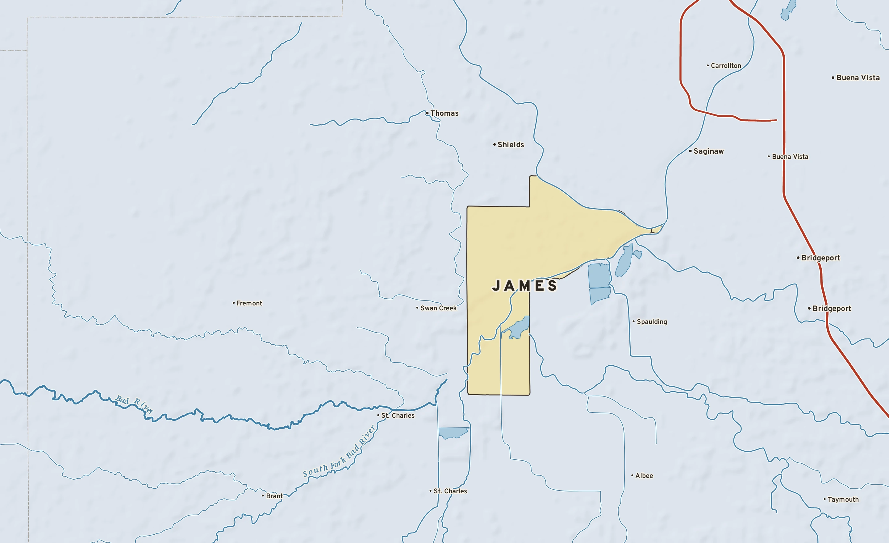 Shaded-relief atlas plate of James, Michigan: rivers, roads, the city limits and where the water drains.