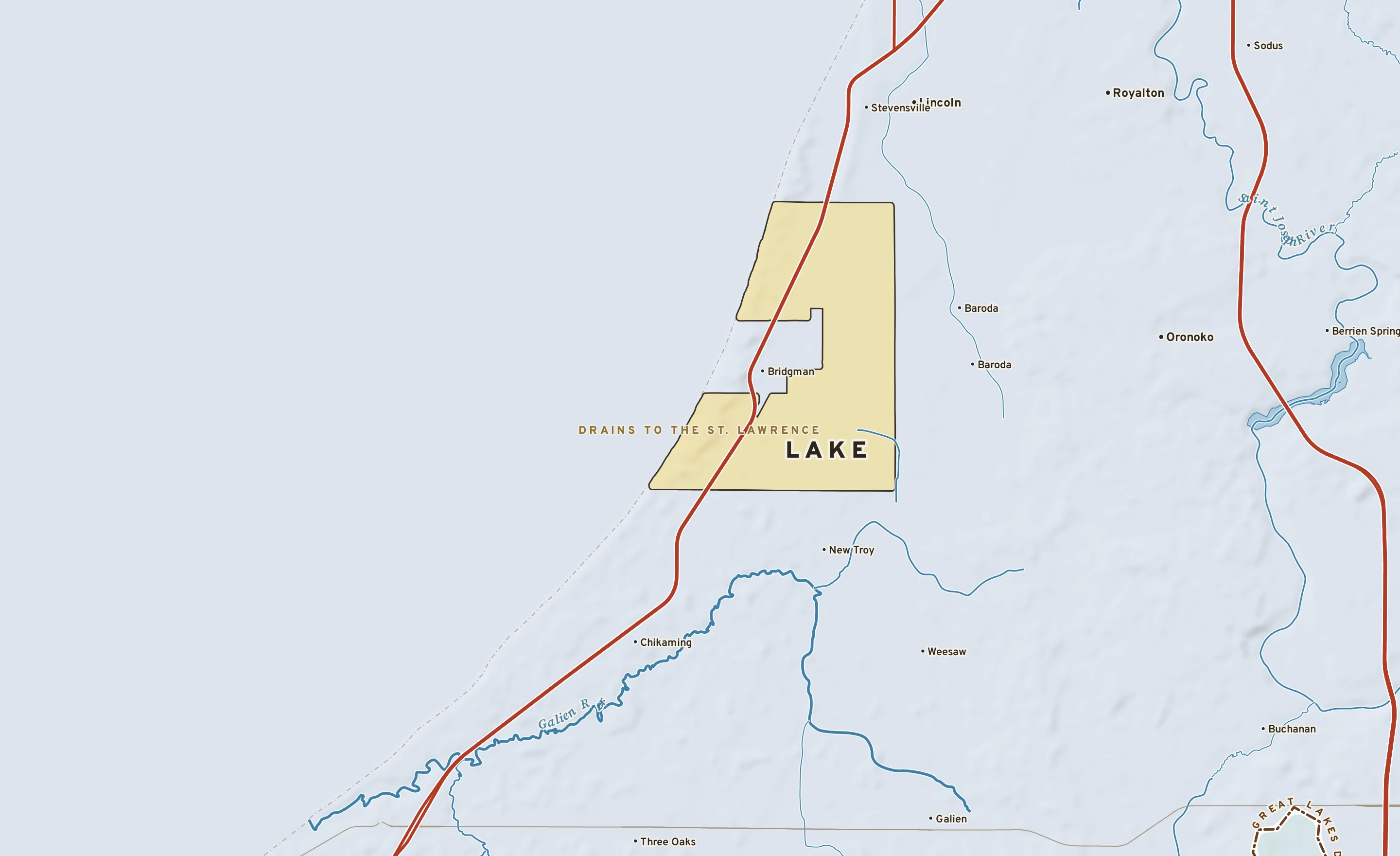 Shaded-relief atlas plate of Lake, Michigan: rivers, roads, the city limits and where the water drains.