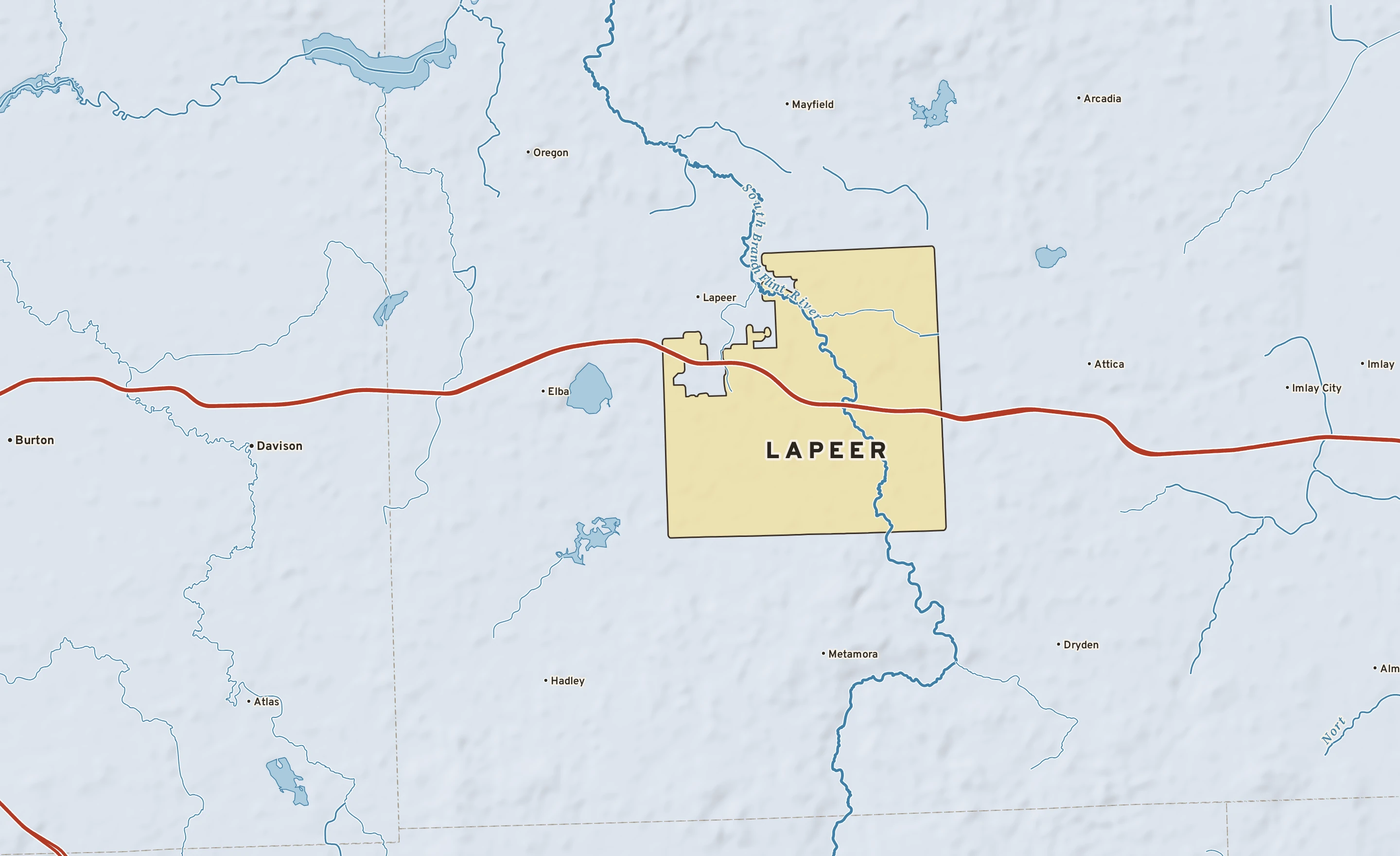 Shaded-relief atlas plate of Lapeer, Michigan: rivers, roads, the city limits and where the water drains.