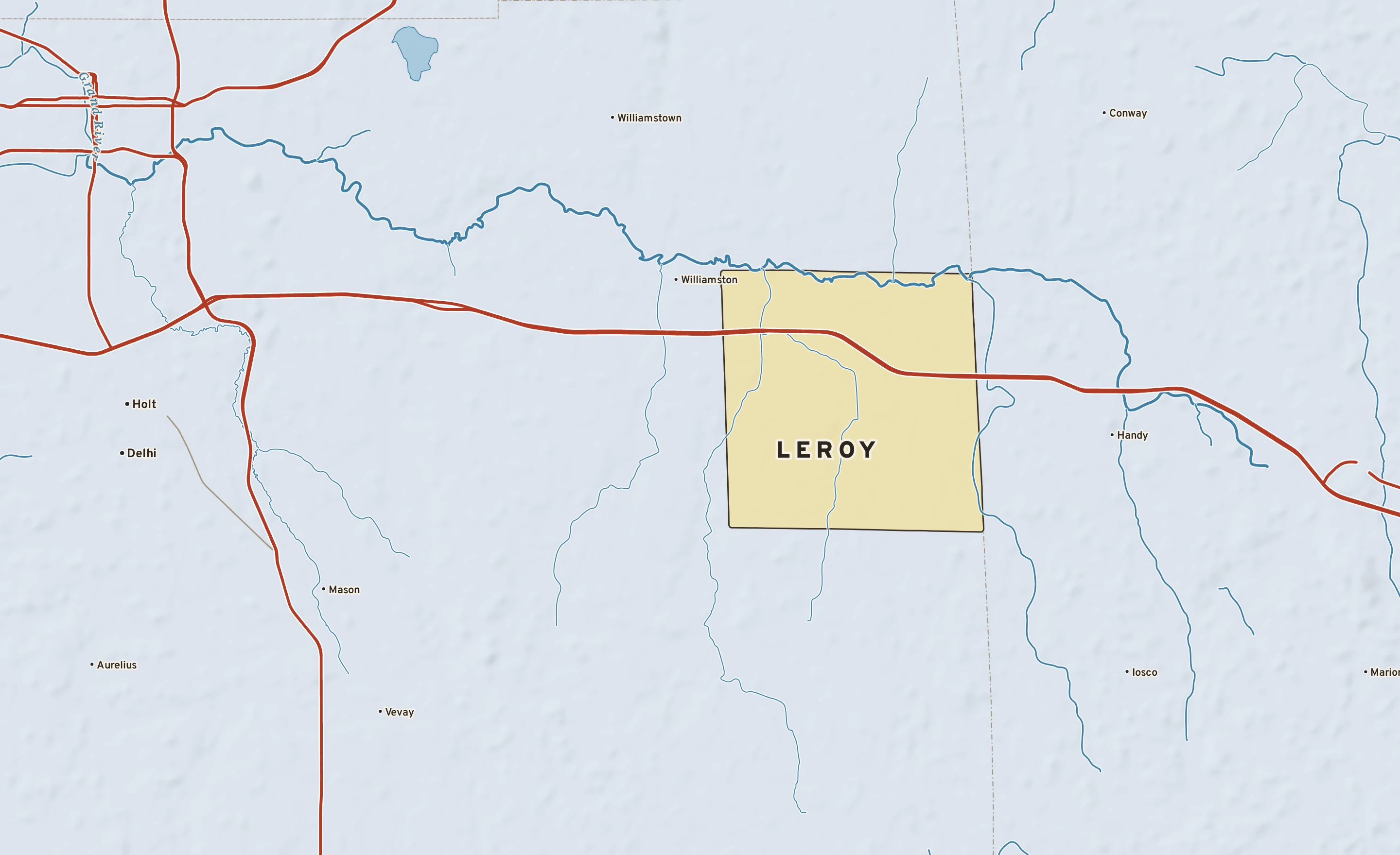 Shaded-relief atlas plate of Leroy, Michigan: rivers, roads, the city limits and where the water drains.