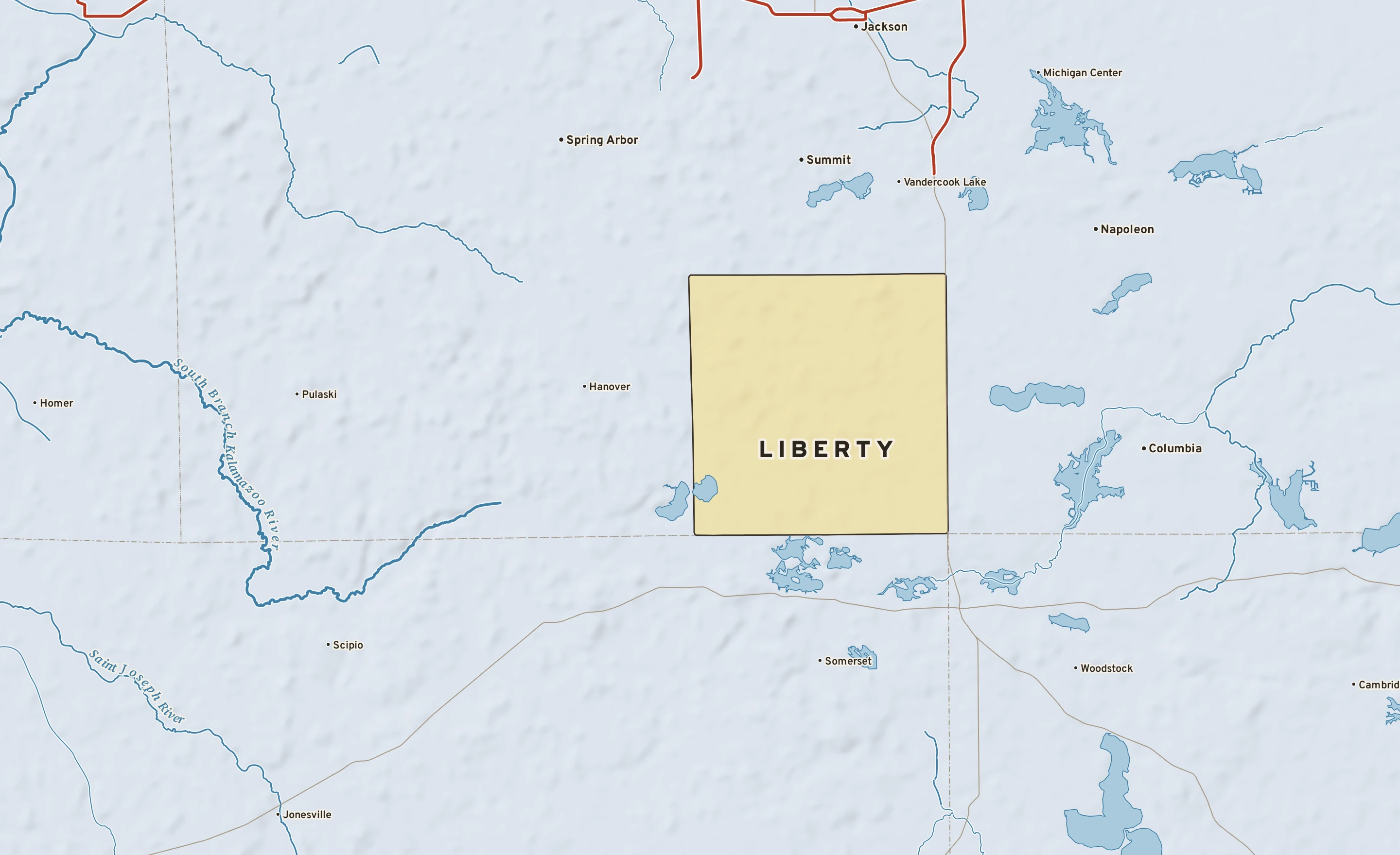 Shaded-relief atlas plate of Liberty, Michigan: rivers, roads, the city limits and where the water drains.