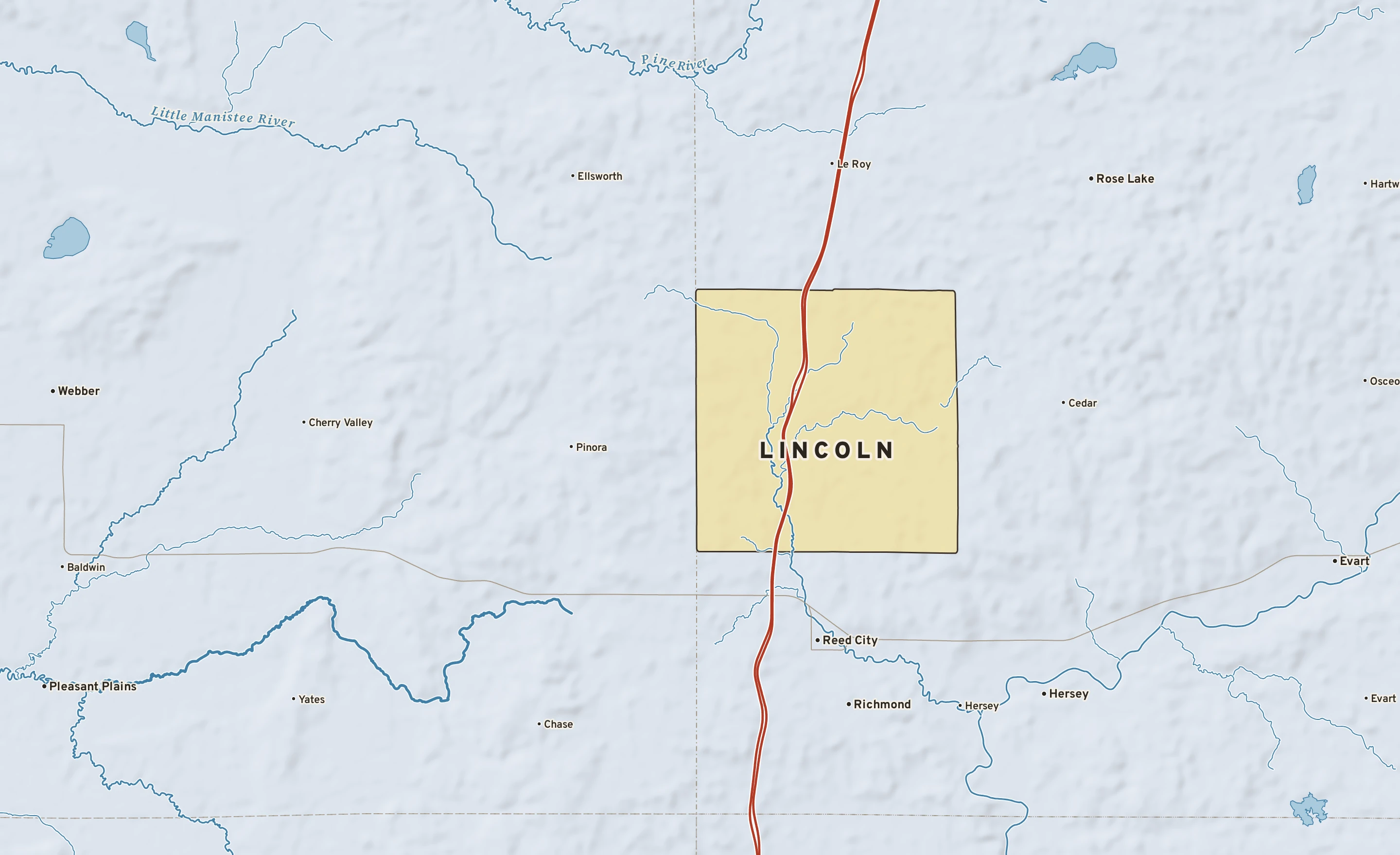 Shaded-relief atlas plate of Lincoln, Michigan: rivers, roads, the city limits and where the water drains.