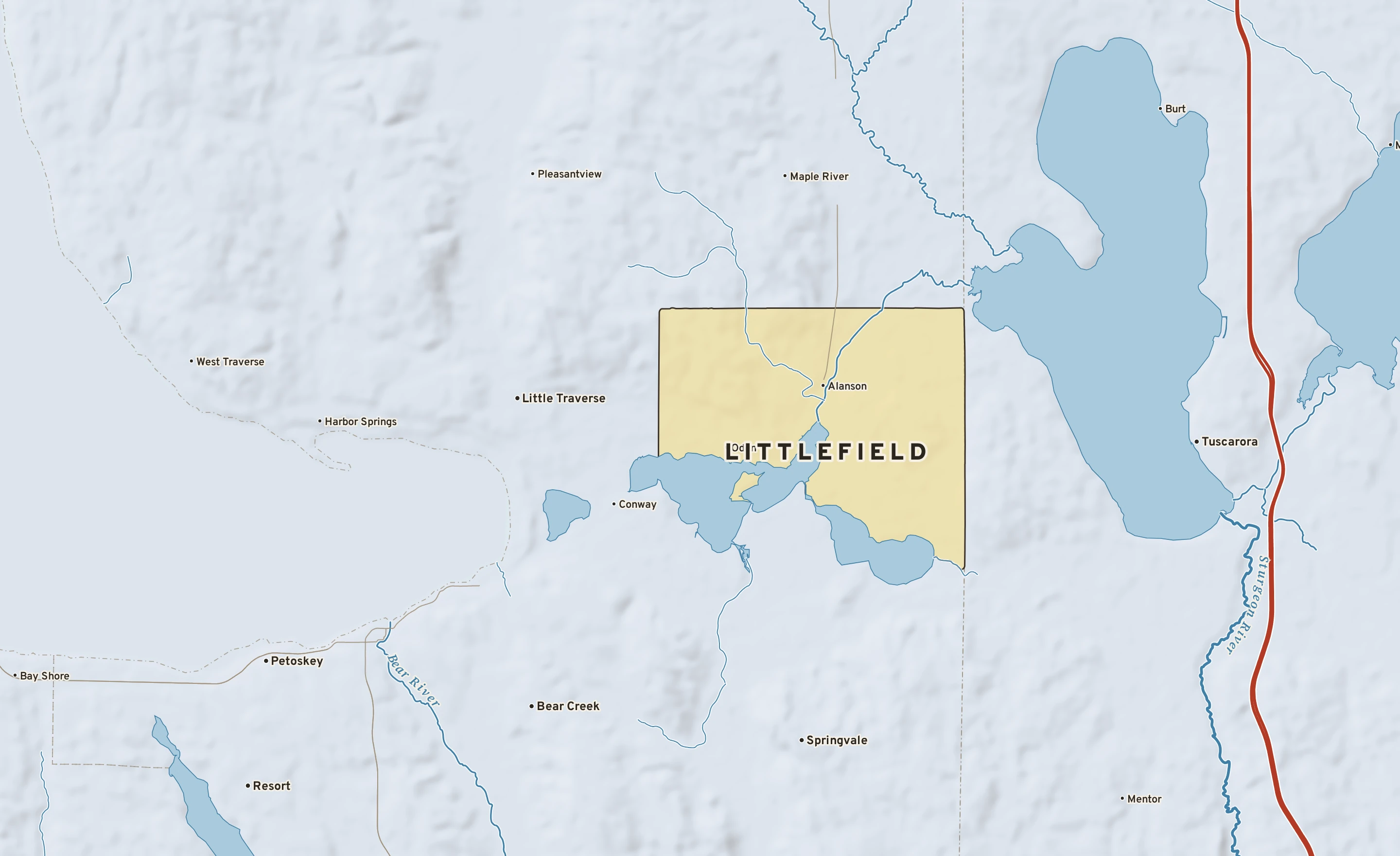 Shaded-relief atlas plate of Littlefield, Michigan: rivers, roads, the city limits and where the water drains.