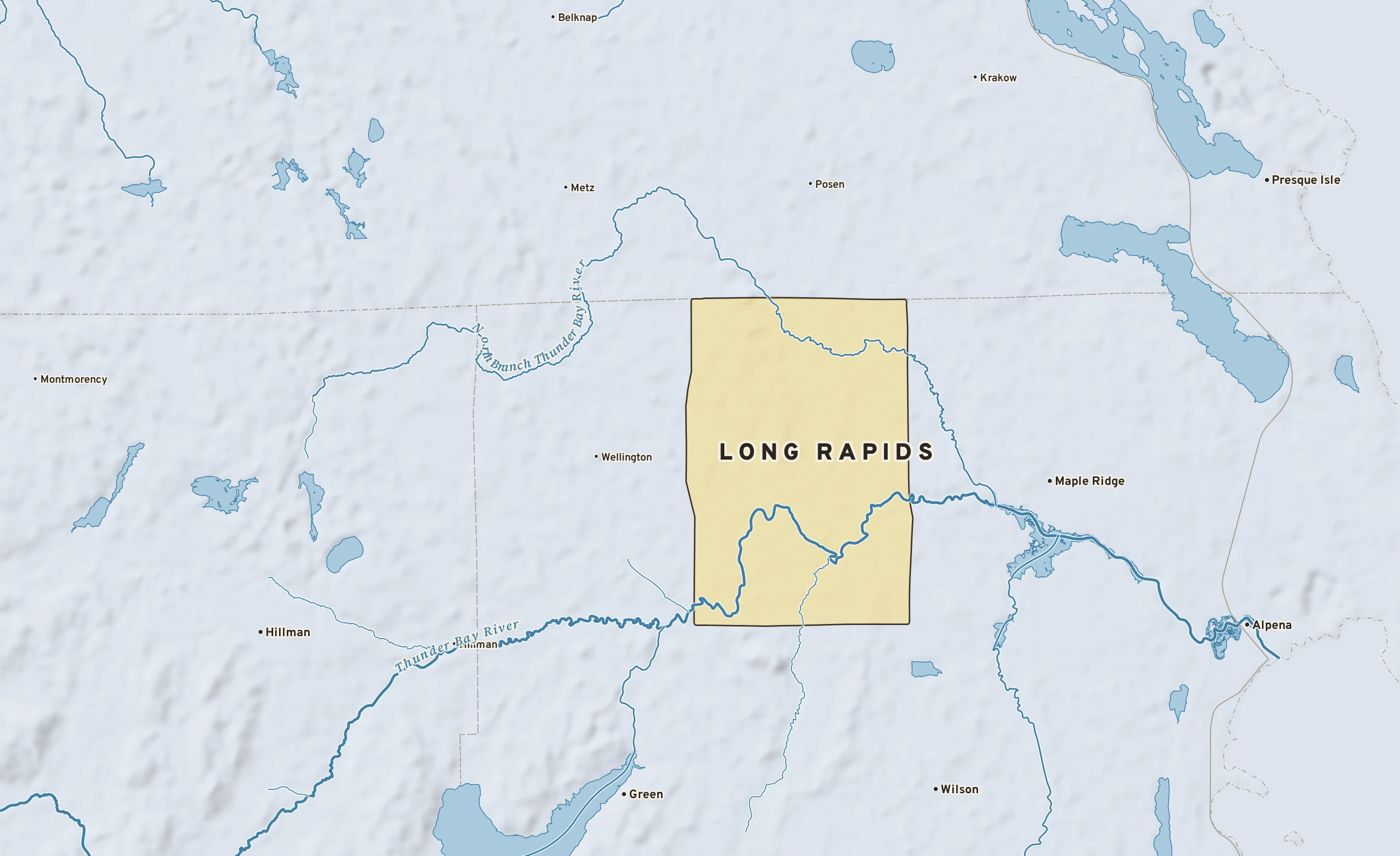 Shaded-relief atlas plate of Long Rapids, Michigan: rivers, roads, the city limits and where the water drains.