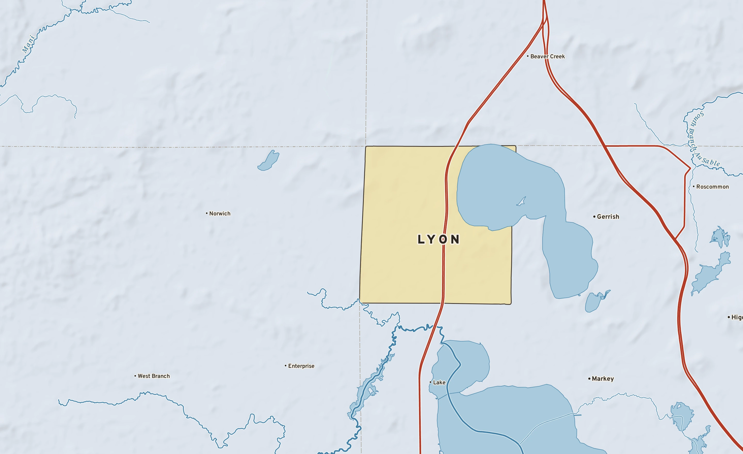 Shaded-relief atlas plate of Lyon, Michigan: rivers, roads, the city limits and where the water drains.