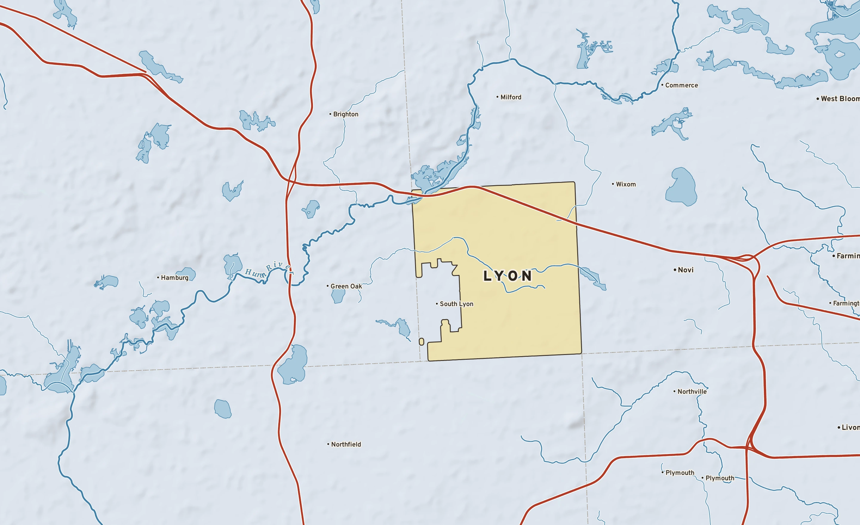 Shaded-relief atlas plate of Lyon, Michigan: rivers, roads, the city limits and where the water drains.
