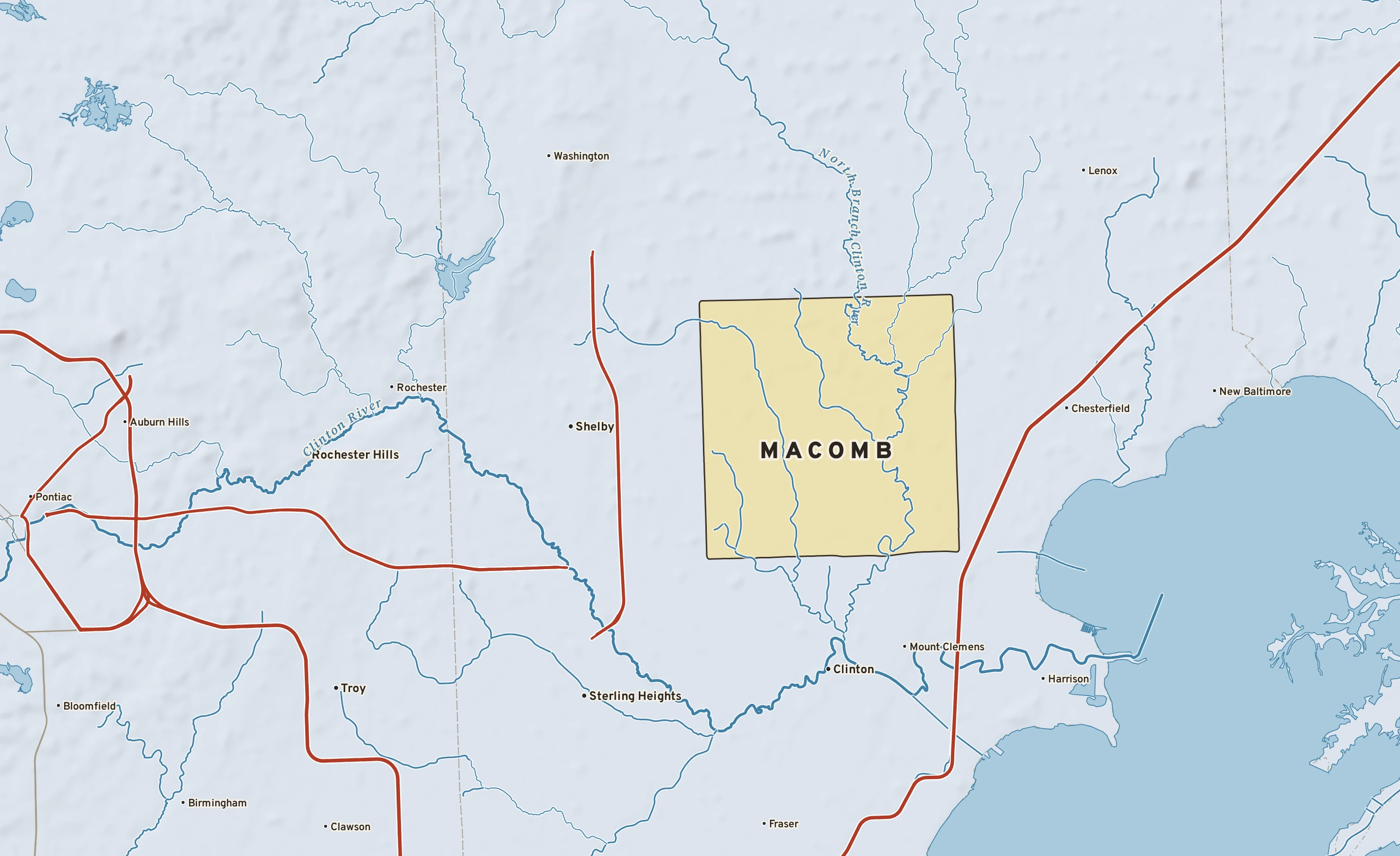Shaded-relief atlas plate of Macomb, Michigan: rivers, roads, the city limits and where the water drains.