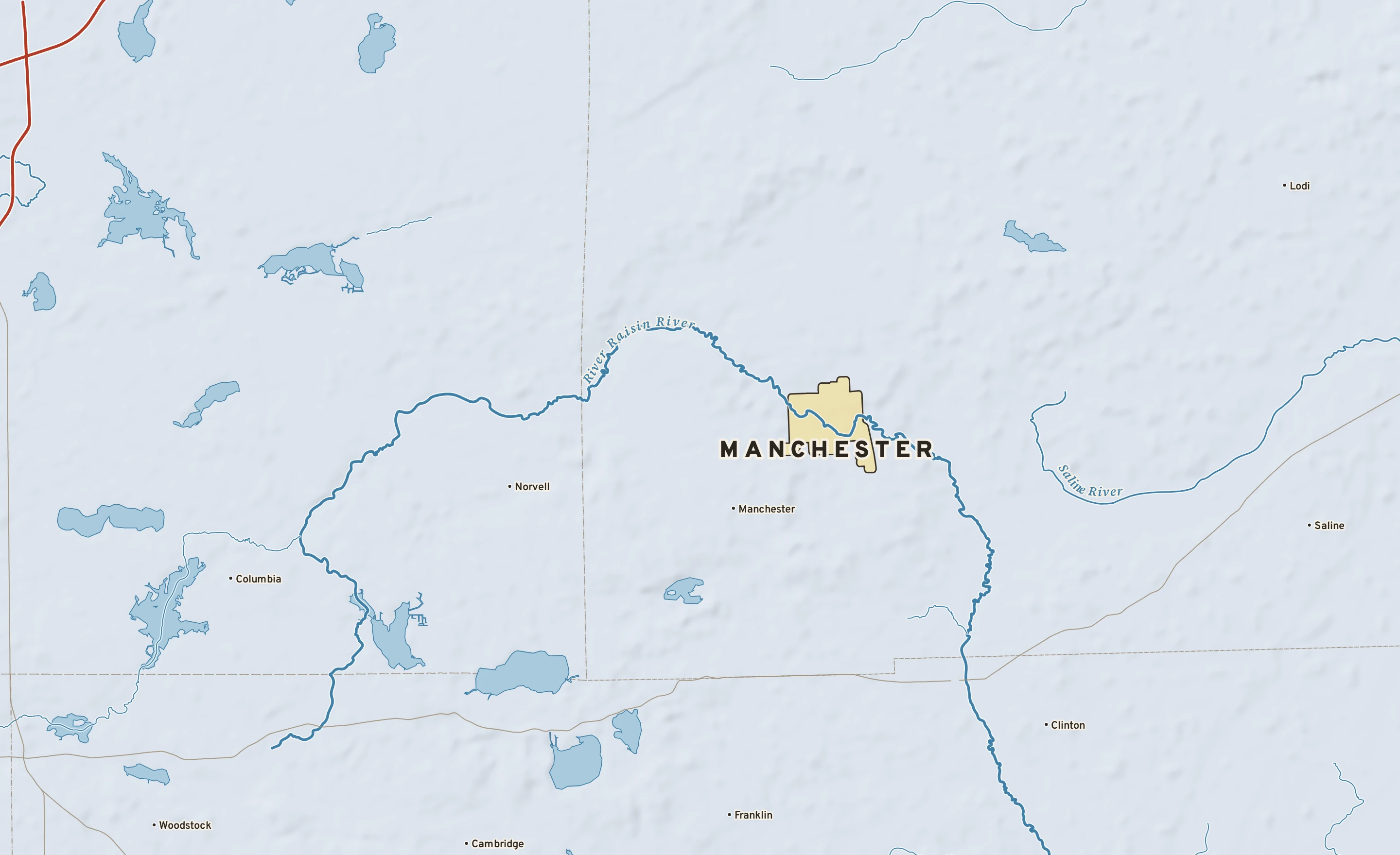 Shaded-relief atlas plate of Manchester, Michigan: rivers, roads, the city limits and where the water drains.
