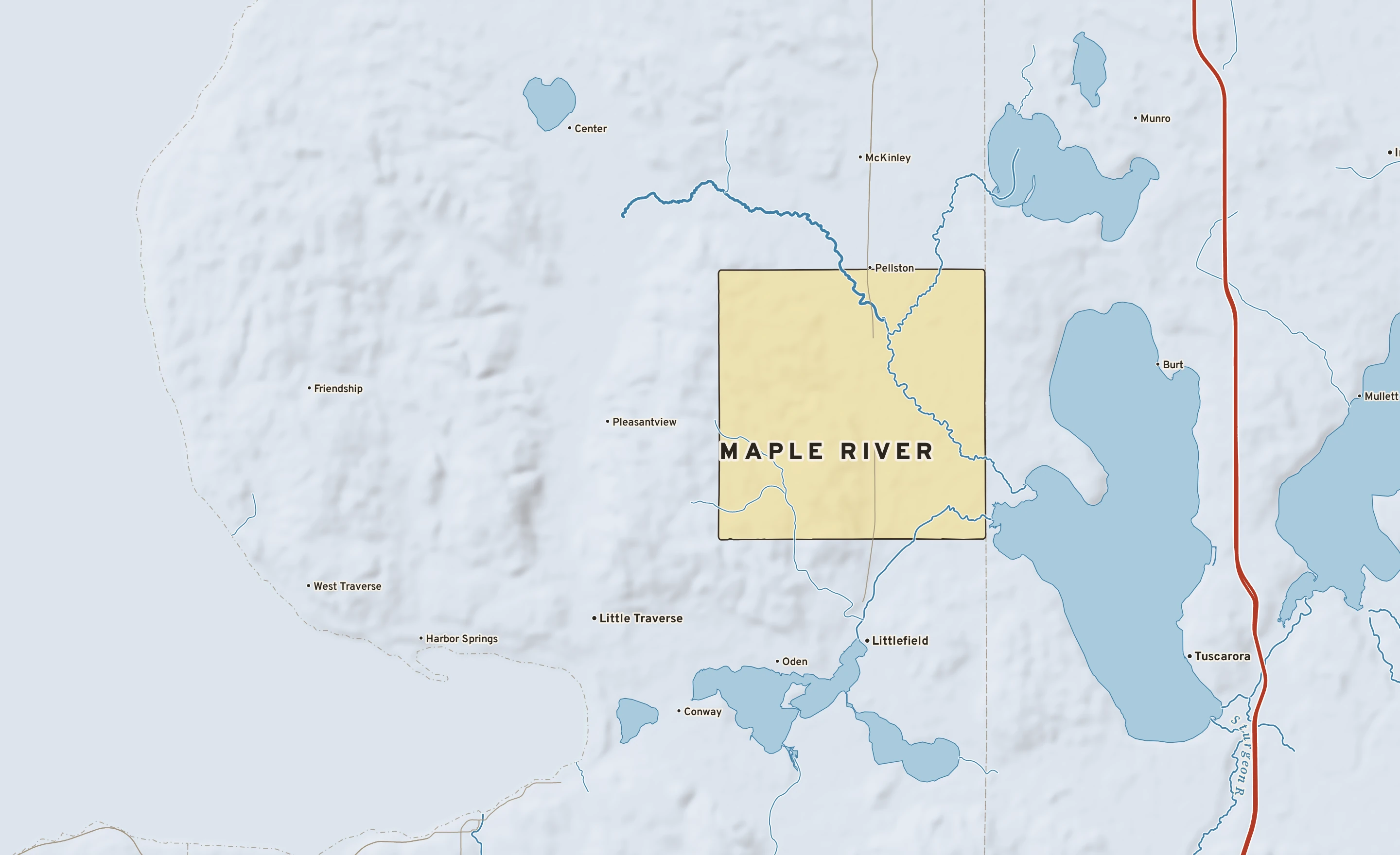 Shaded-relief atlas plate of Maple River, Michigan: rivers, roads, the city limits and where the water drains.