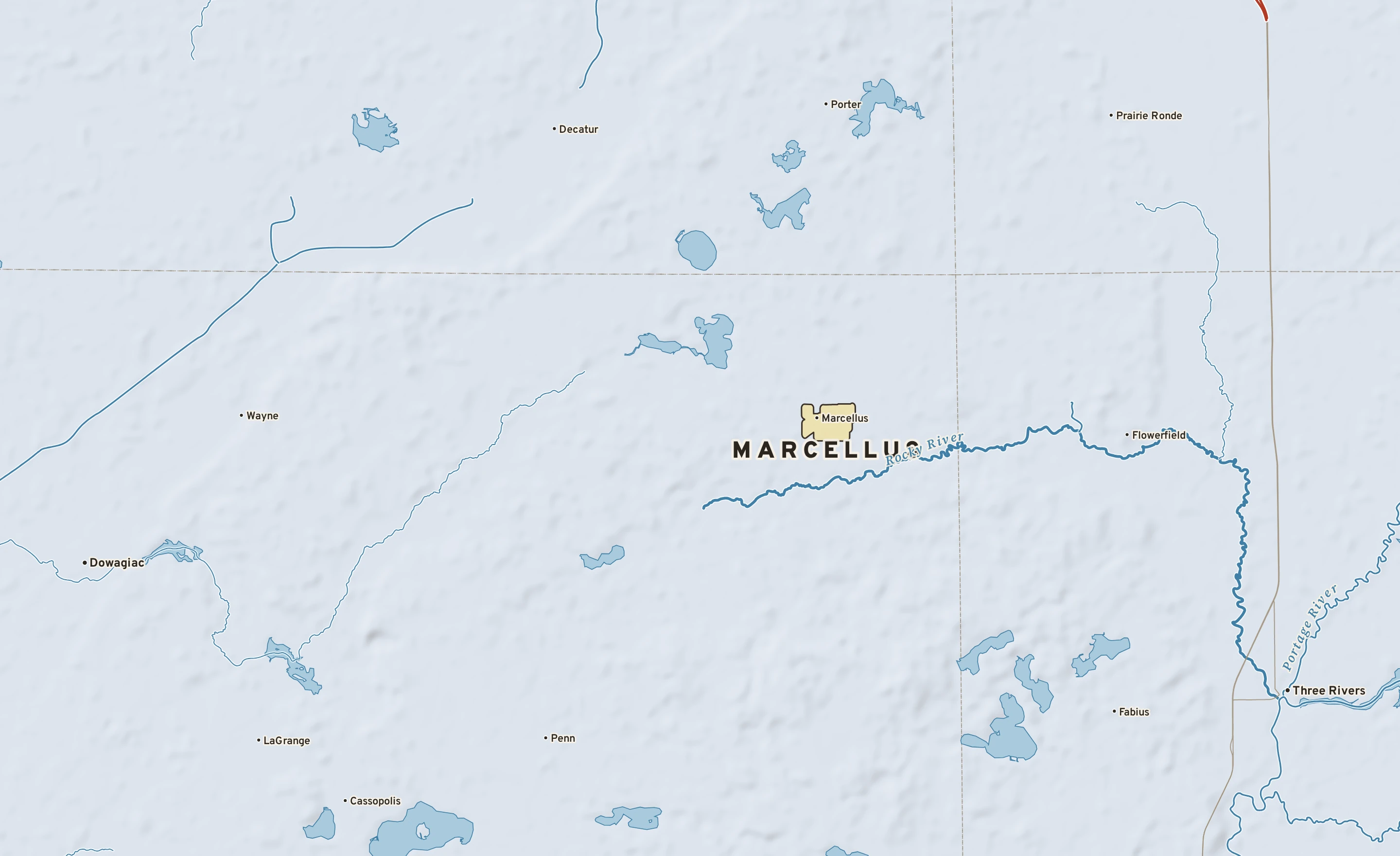 Shaded-relief atlas plate of Marcellus, Michigan: rivers, roads, the city limits and where the water drains.