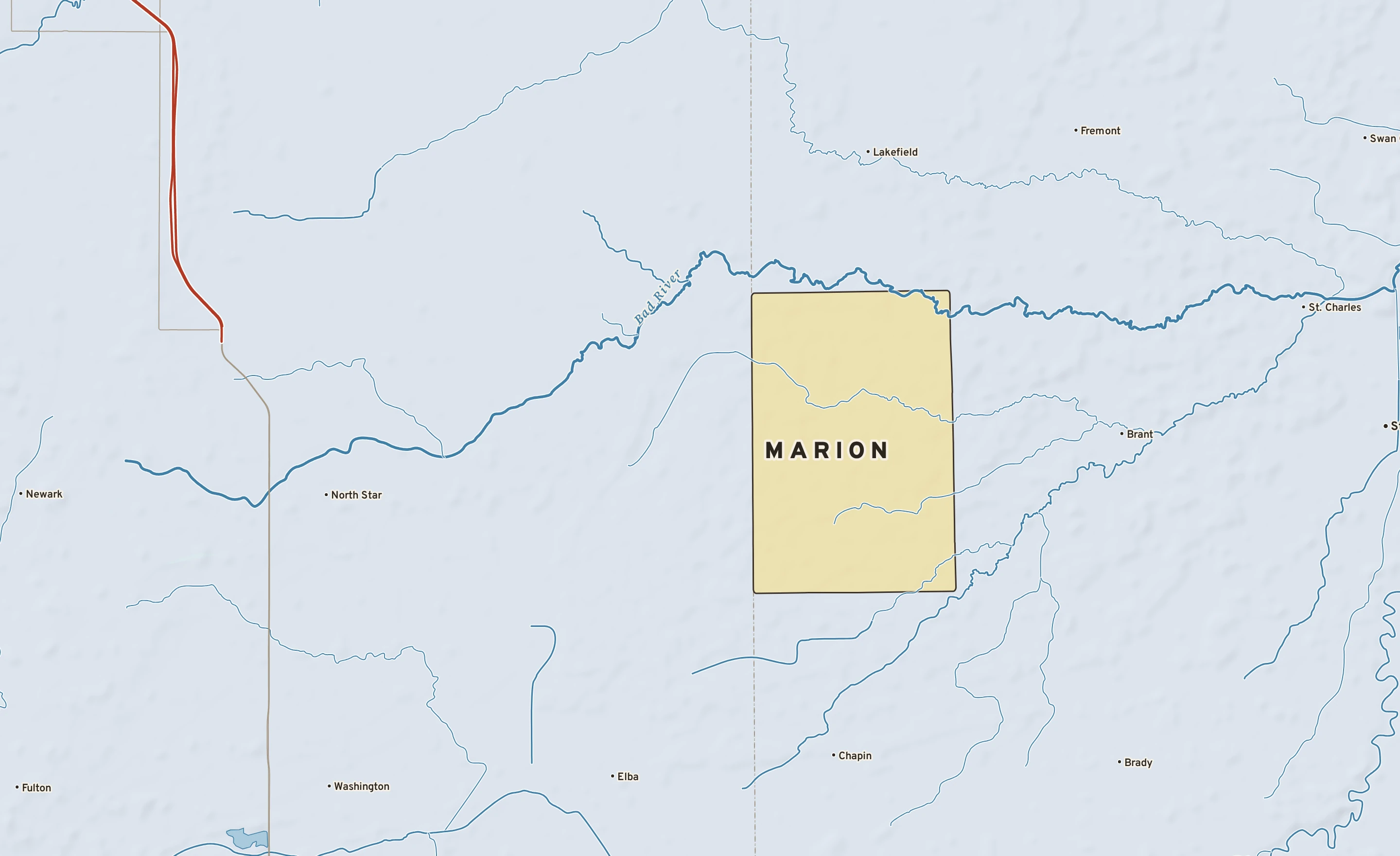 Shaded-relief atlas plate of Marion, Michigan: rivers, roads, the city limits and where the water drains.