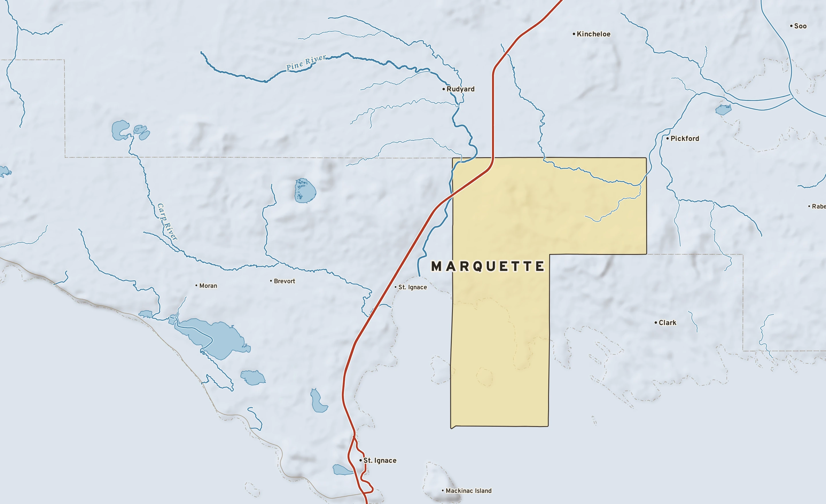 Shaded-relief atlas plate of Marquette, Michigan: rivers, roads, the city limits and where the water drains.