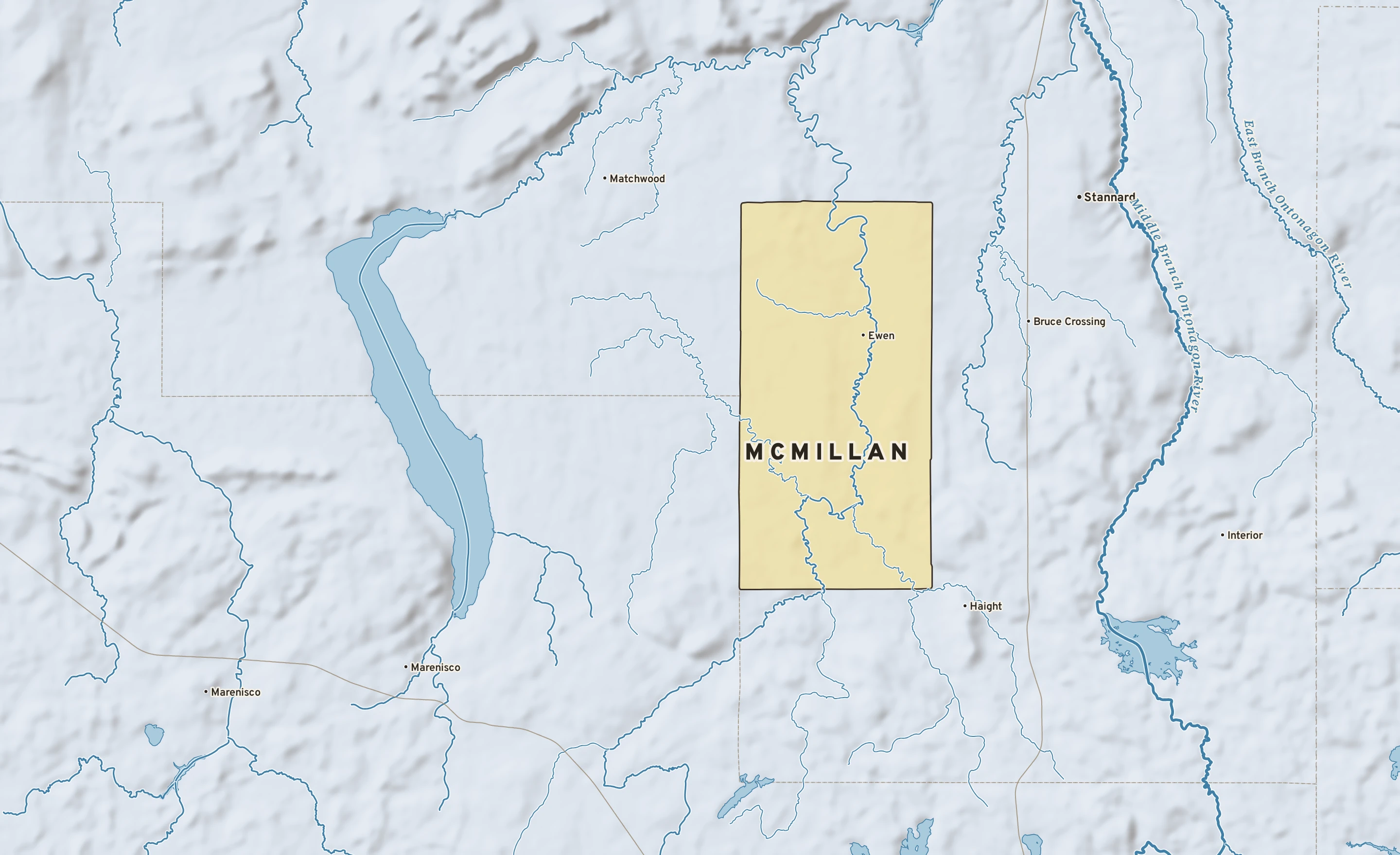 Shaded-relief atlas plate of McMillan, Michigan: rivers, roads, the city limits and where the water drains.