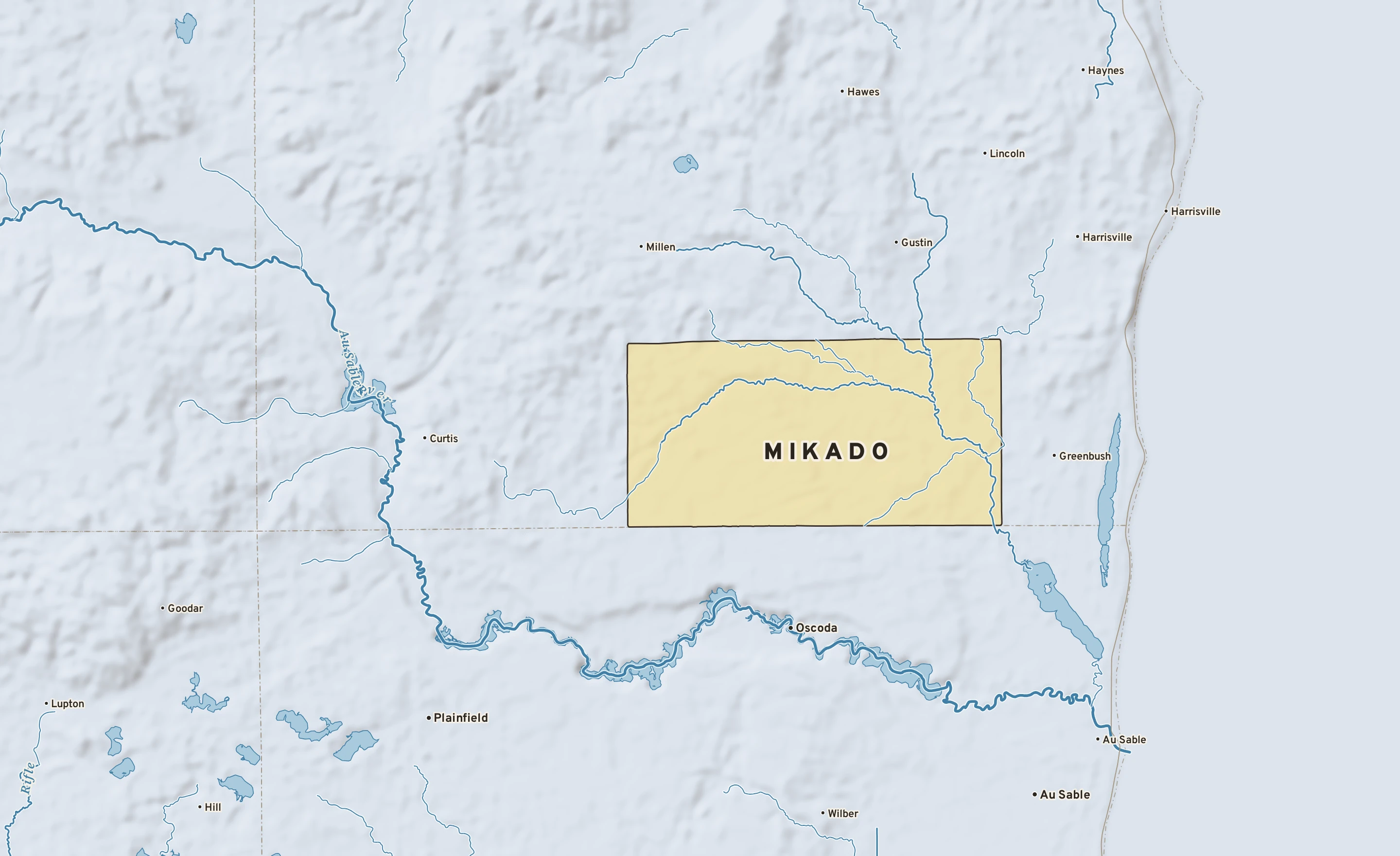 Shaded-relief atlas plate of Mikado, Michigan: rivers, roads, the city limits and where the water drains.