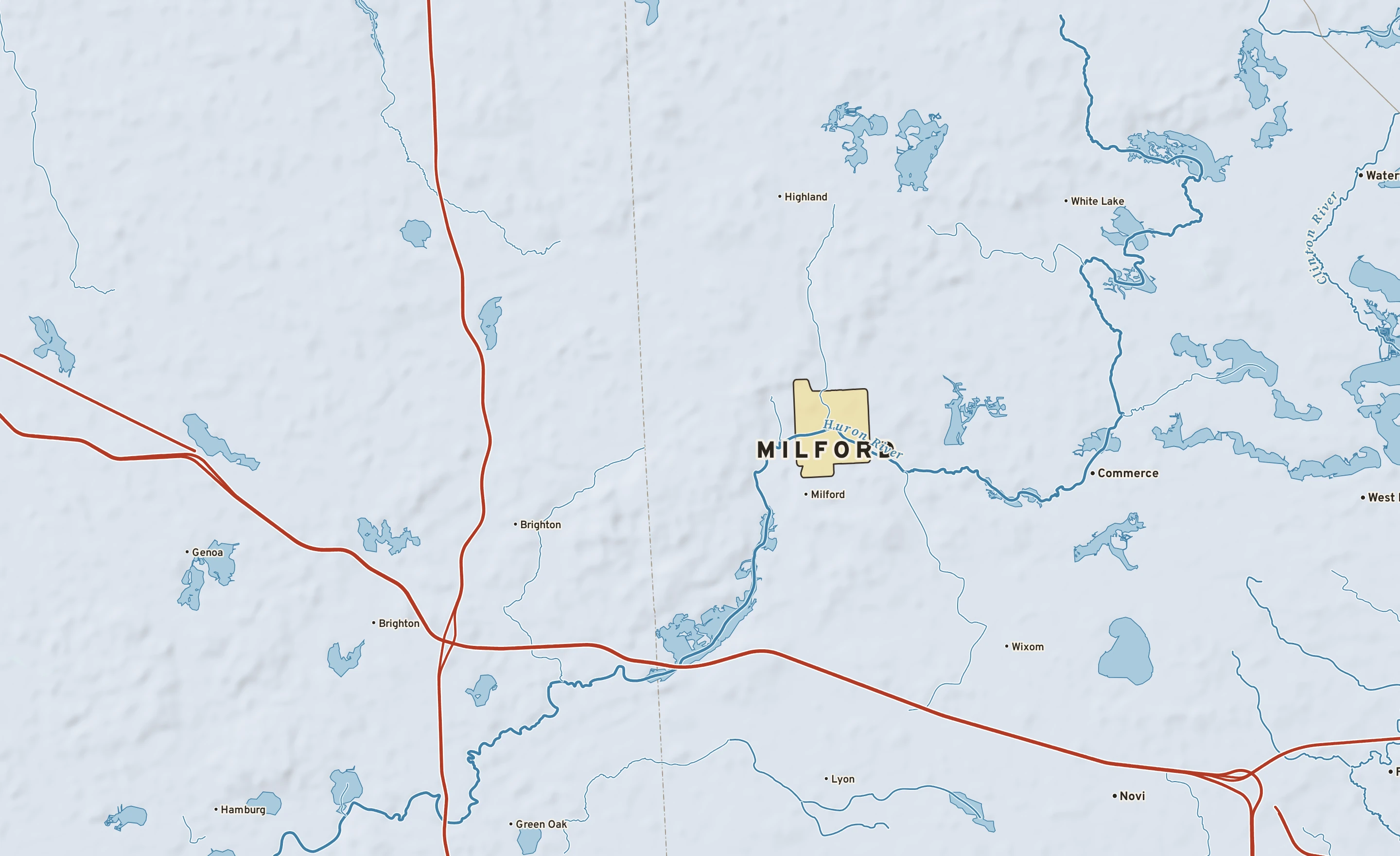 Shaded-relief atlas plate of Milford, Michigan: rivers, roads, the city limits and where the water drains.