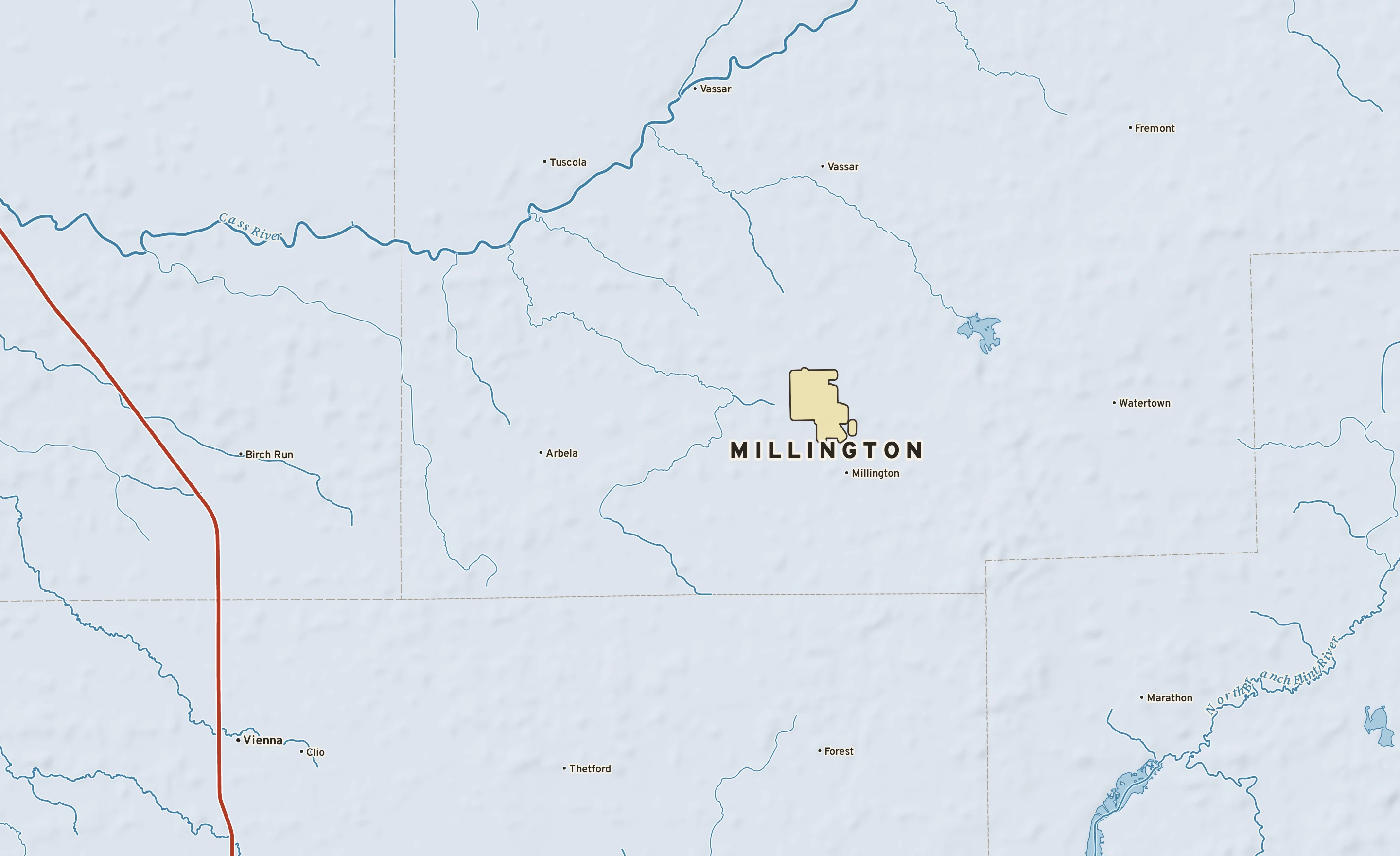 Shaded-relief atlas plate of Millington, Michigan: rivers, roads, the city limits and where the water drains.