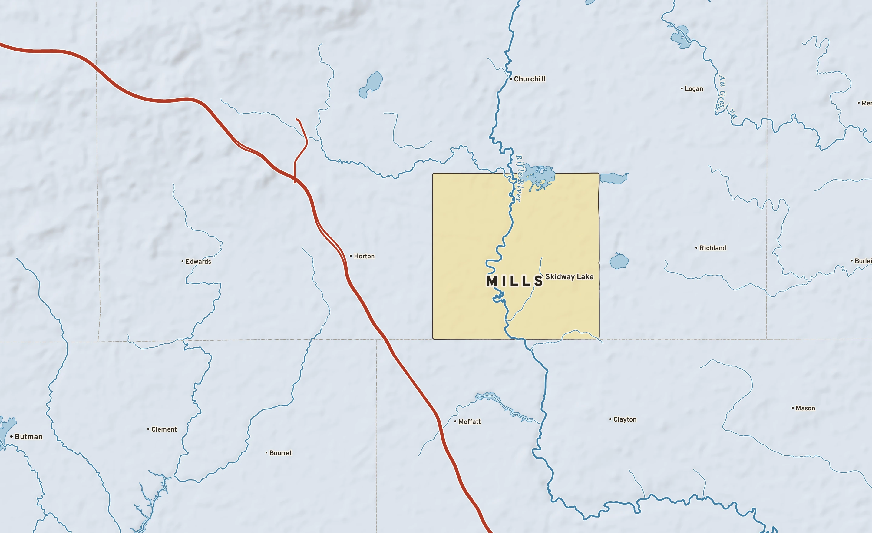 Shaded-relief atlas plate of Mills, Michigan: rivers, roads, the city limits and where the water drains.