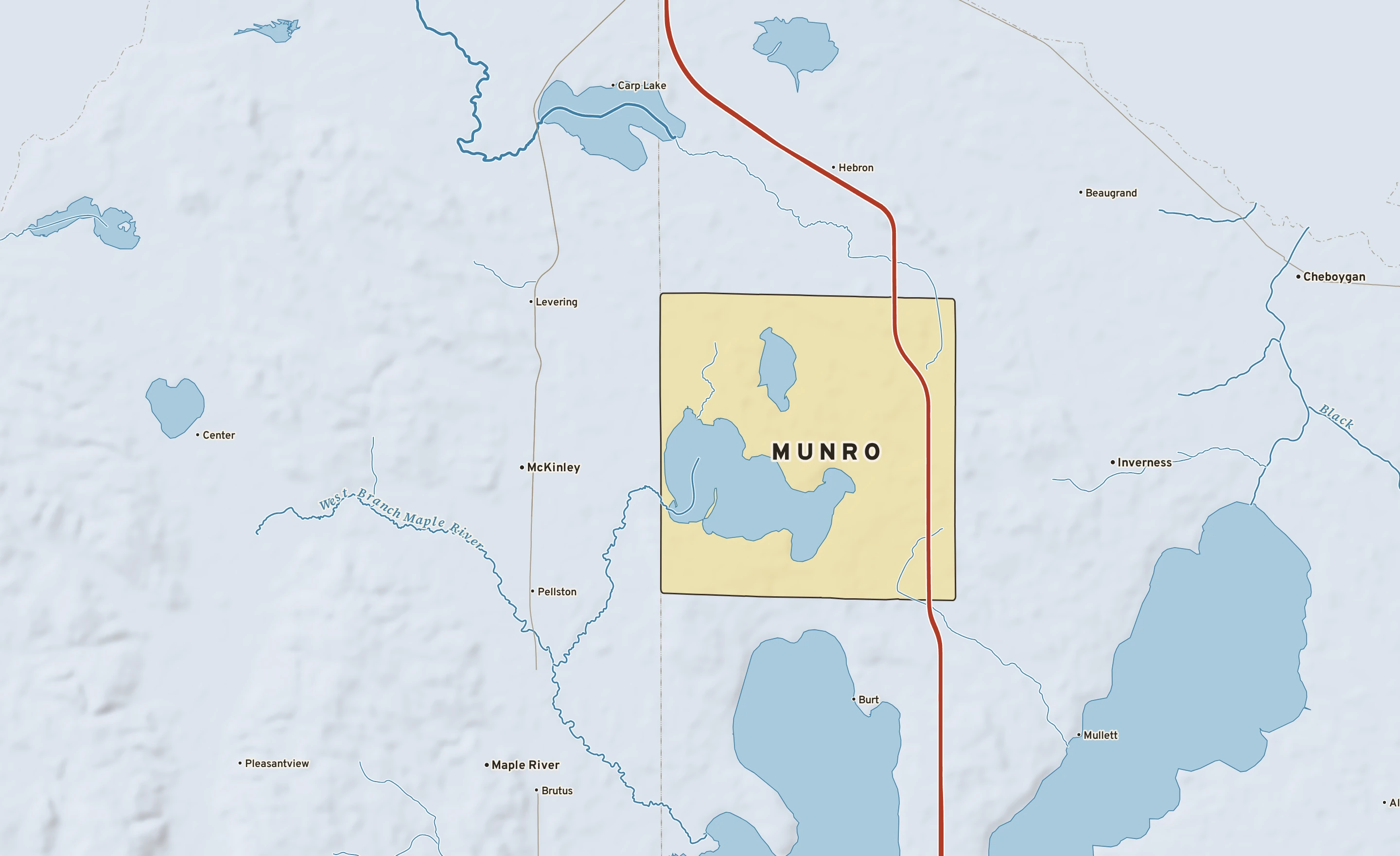 Shaded-relief atlas plate of Munro, Michigan: rivers, roads, the city limits and where the water drains.