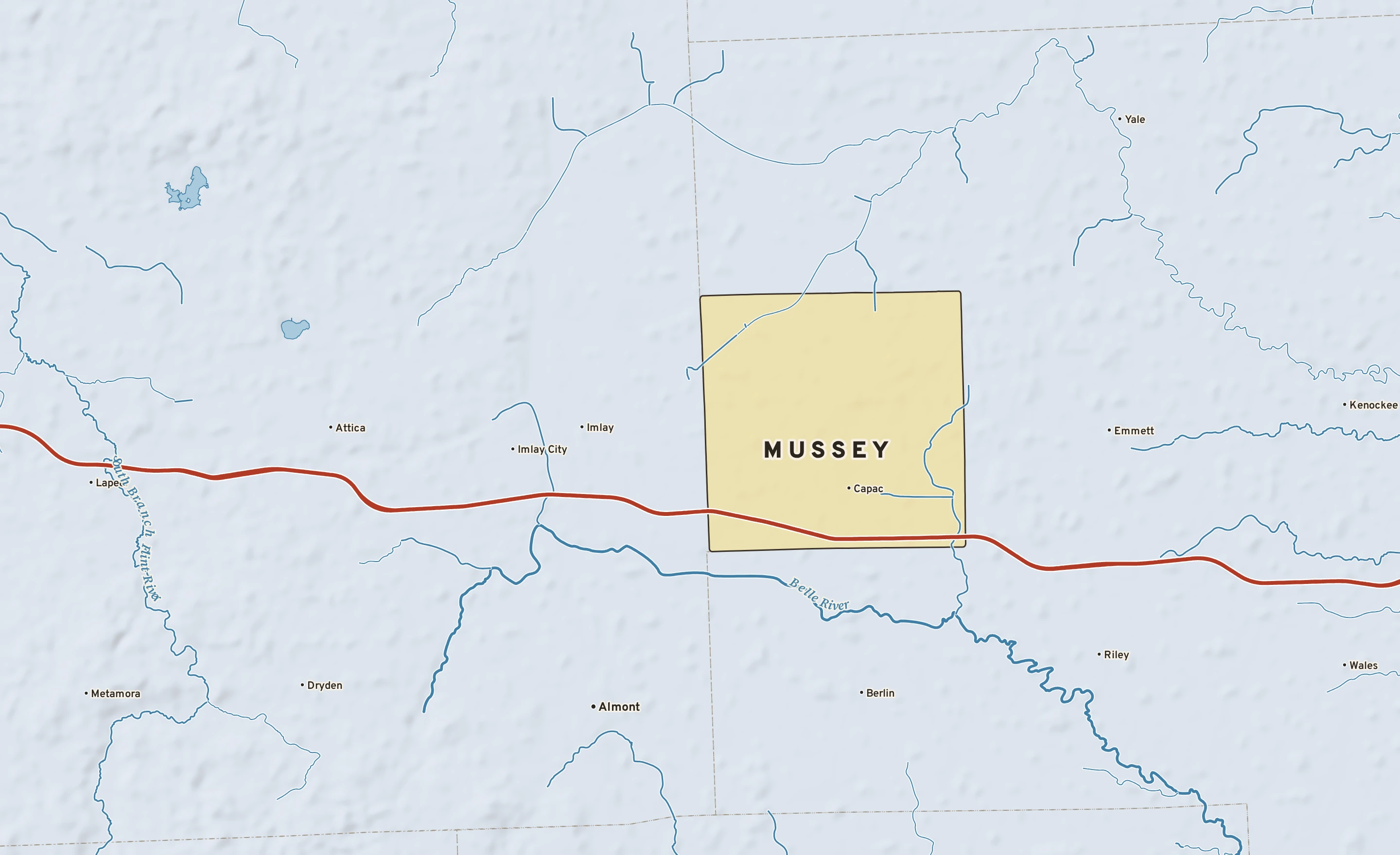 Shaded-relief atlas plate of Mussey, Michigan: rivers, roads, the city limits and where the water drains.