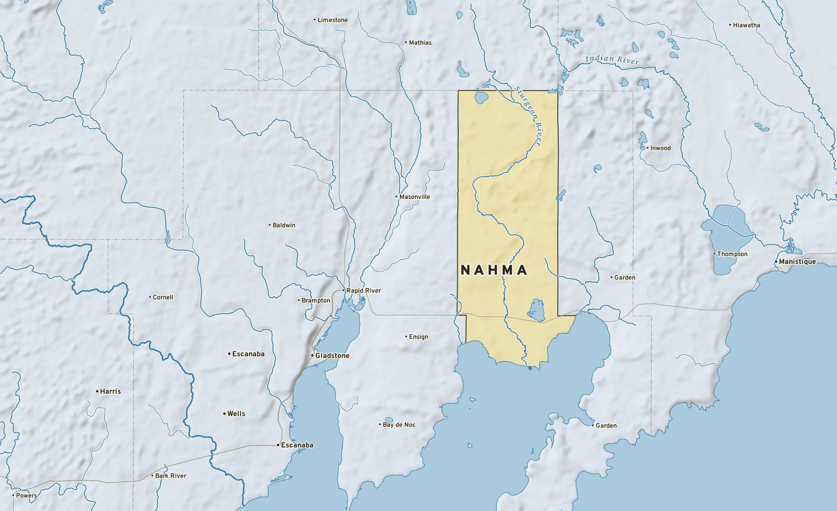 Shaded-relief atlas plate of Nahma, Michigan: rivers, roads, the city limits and where the water drains.