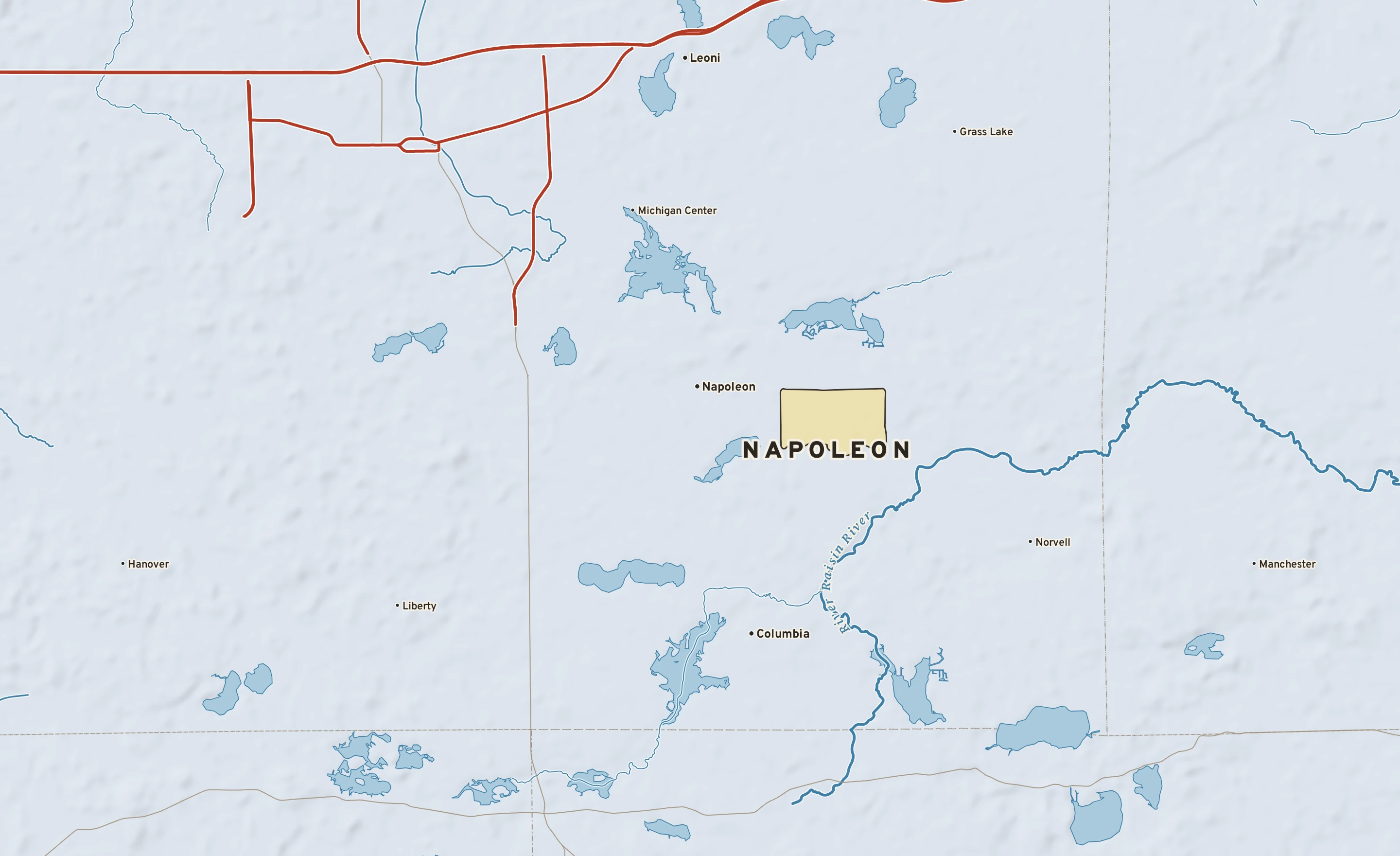 Shaded-relief atlas plate of Napoleon, Michigan: rivers, roads, the city limits and where the water drains.