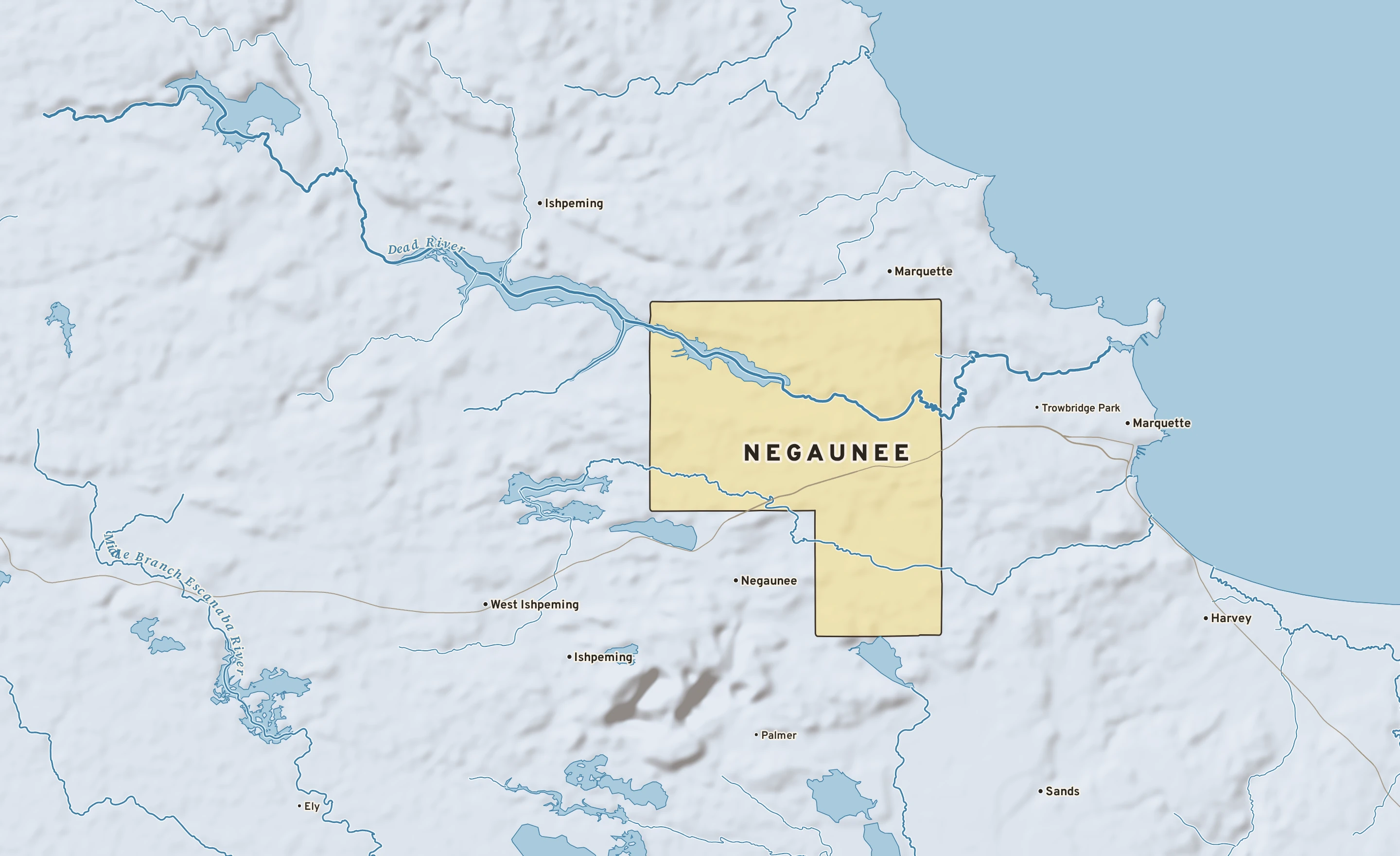 Shaded-relief atlas plate of Negaunee, Michigan: rivers, roads, the city limits and where the water drains.